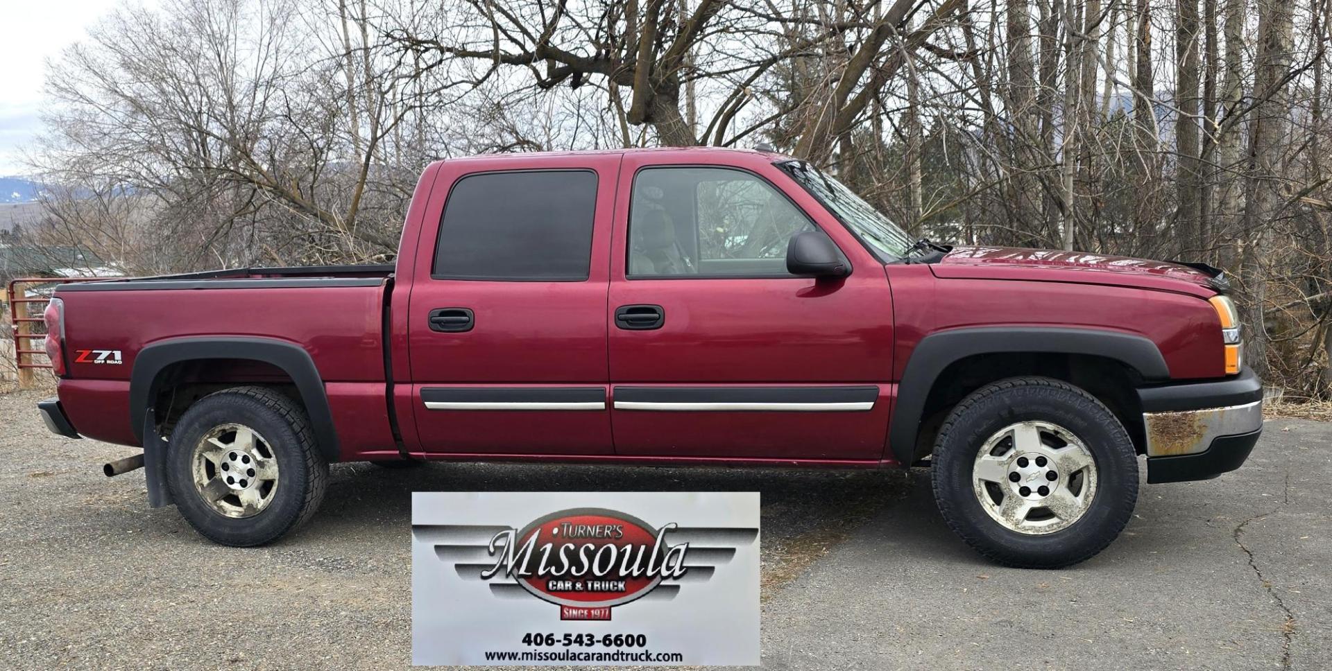 2004 Maroon /Tan Chevrolet Silverado 1500 LS Crew Cab 4WD (2GCEK13T741) with an 5.3L V8 OHV 16V engine, 4-Speed Automatic Overdrive transmission, located at 450 N Russell, Missoula, MT, 59801, (406) 543-6600, 46.874496, -114.017433 - Strong Running 4WD Chevy. 5.3L V8 Engine. Automatic Transmission. Heated Leather Power Front Seats. Rear DVD Player. Power Windows and Locks. AM FM CD Player.Running Boards. Has a check engine light saying there is a misfire but the truck runs great. Does have a Branded Title because the State of Mo - Photo#3