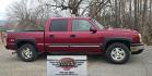 2004 Maroon /Tan Chevrolet Silverado 1500 LS Crew Cab 4WD (2GCEK13T741) with an 5.3L V8 OHV 16V engine, 4-Speed Automatic Overdrive transmission, located at 450 N Russell, Missoula, MT, 59801, (406) 543-6600, 46.874496, -114.017433 - Strong Running 4WD Chevy. 5.3L V8 Engine. Automatic Transmission. Heated Leather Power Front Seats. Rear DVD Player. Power Windows and Locks. AM FM CD Player.Running Boards. Has a check engine light saying there is a misfire but the truck runs great. Does have a Branded Title because the State of Mo - Photo#3