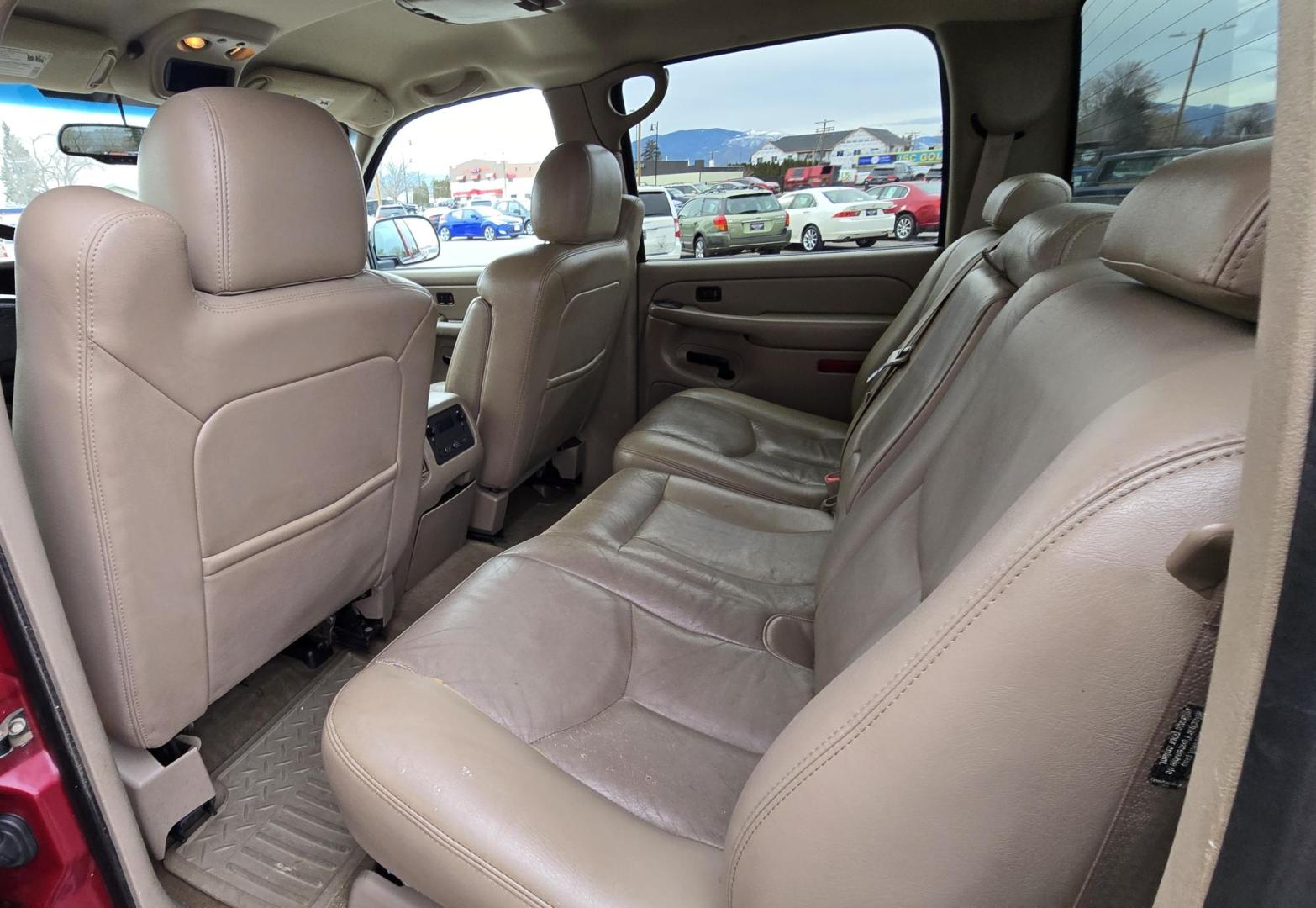 2004 Maroon /Tan Chevrolet Silverado 1500 LS Crew Cab 4WD (2GCEK13T741) with an 5.3L V8 OHV 16V engine, 4-Speed Automatic Overdrive transmission, located at 450 N Russell, Missoula, MT, 59801, (406) 543-6600, 46.874496, -114.017433 - Strong Running 4WD Chevy. 5.3L V8 Engine. Automatic Transmission. Heated Leather Power Front Seats. Rear DVD Player. Power Windows and Locks. AM FM CD Player.Running Boards. Has a check engine light saying there is a misfire but the truck runs great. Does have a Branded Title because the State of Mo - Photo#10
