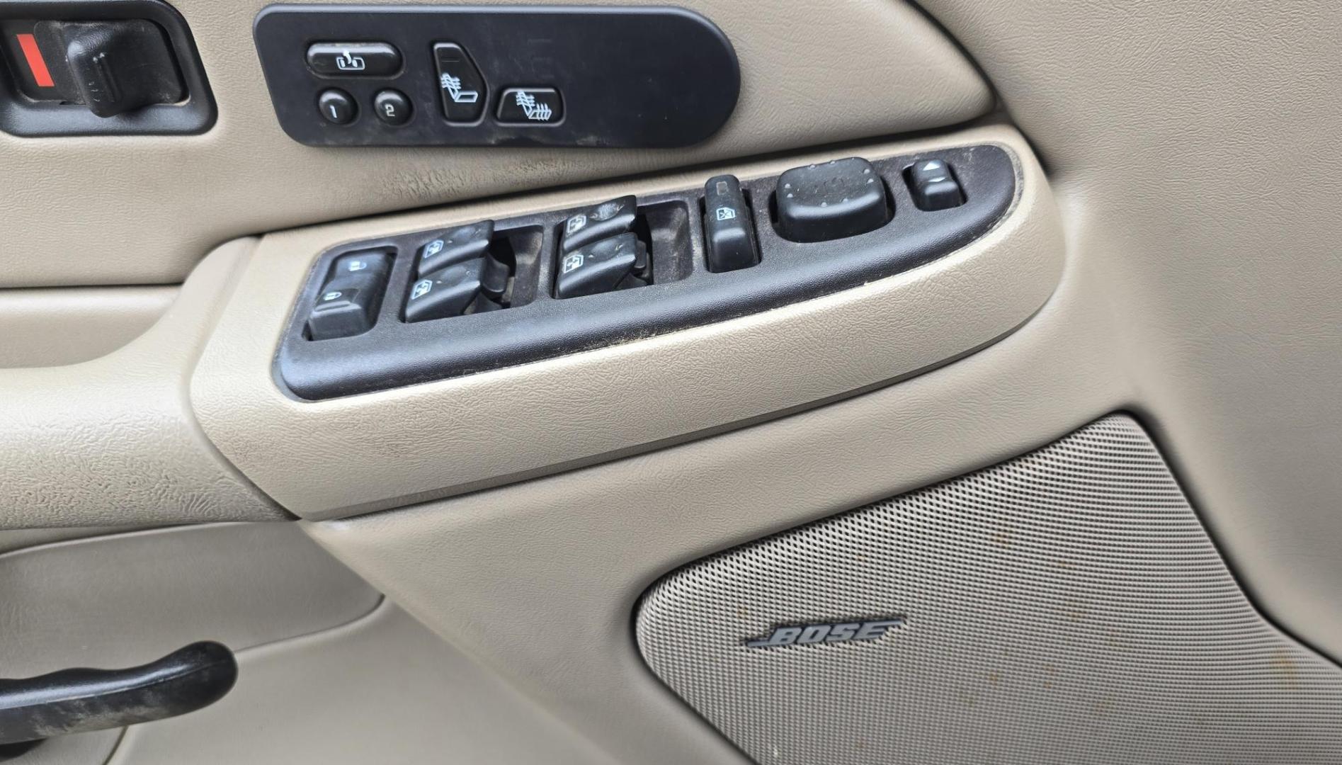 2004 Maroon /Tan Chevrolet Silverado 1500 LS Crew Cab 4WD (2GCEK13T741) with an 5.3L V8 OHV 16V engine, 4-Speed Automatic Overdrive transmission, located at 450 N Russell, Missoula, MT, 59801, (406) 543-6600, 46.874496, -114.017433 - Strong Running 4WD Chevy. 5.3L V8 Engine. Automatic Transmission. Heated Leather Power Front Seats. Rear DVD Player. Power Windows and Locks. AM FM CD Player.Running Boards. Has a check engine light saying there is a misfire but the truck runs great. Does have a Branded Title because the State of Mo - Photo#13