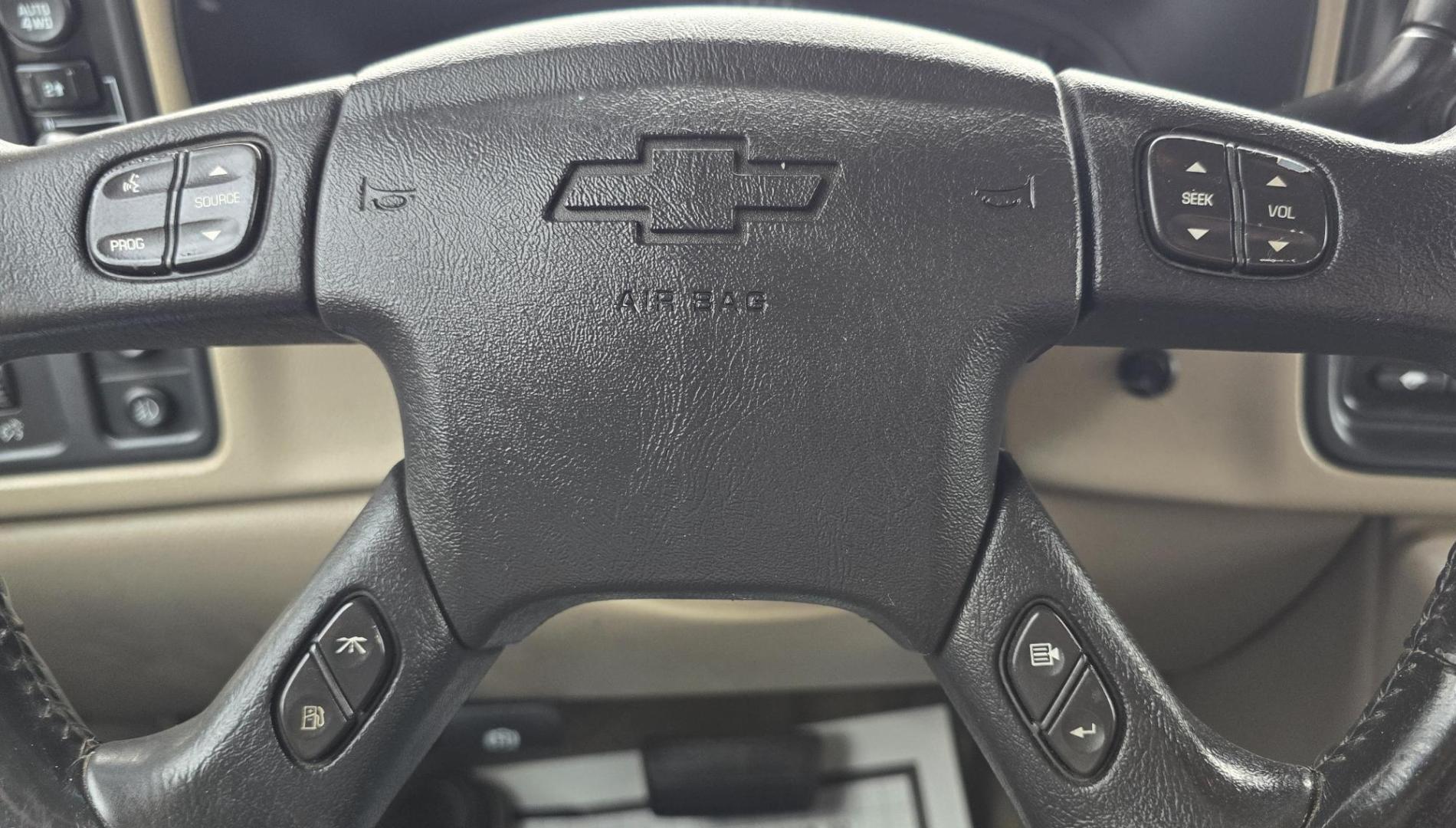 2004 Maroon /Tan Chevrolet Silverado 1500 LS Crew Cab 4WD (2GCEK13T741) with an 5.3L V8 OHV 16V engine, 4-Speed Automatic Overdrive transmission, located at 450 N Russell, Missoula, MT, 59801, (406) 543-6600, 46.874496, -114.017433 - Strong Running 4WD Chevy. 5.3L V8 Engine. Automatic Transmission. Heated Leather Power Front Seats. Rear DVD Player. Power Windows and Locks. AM FM CD Player.Running Boards. Has a check engine light saying there is a misfire but the truck runs great. Does have a Branded Title because the State of Mo - Photo#15