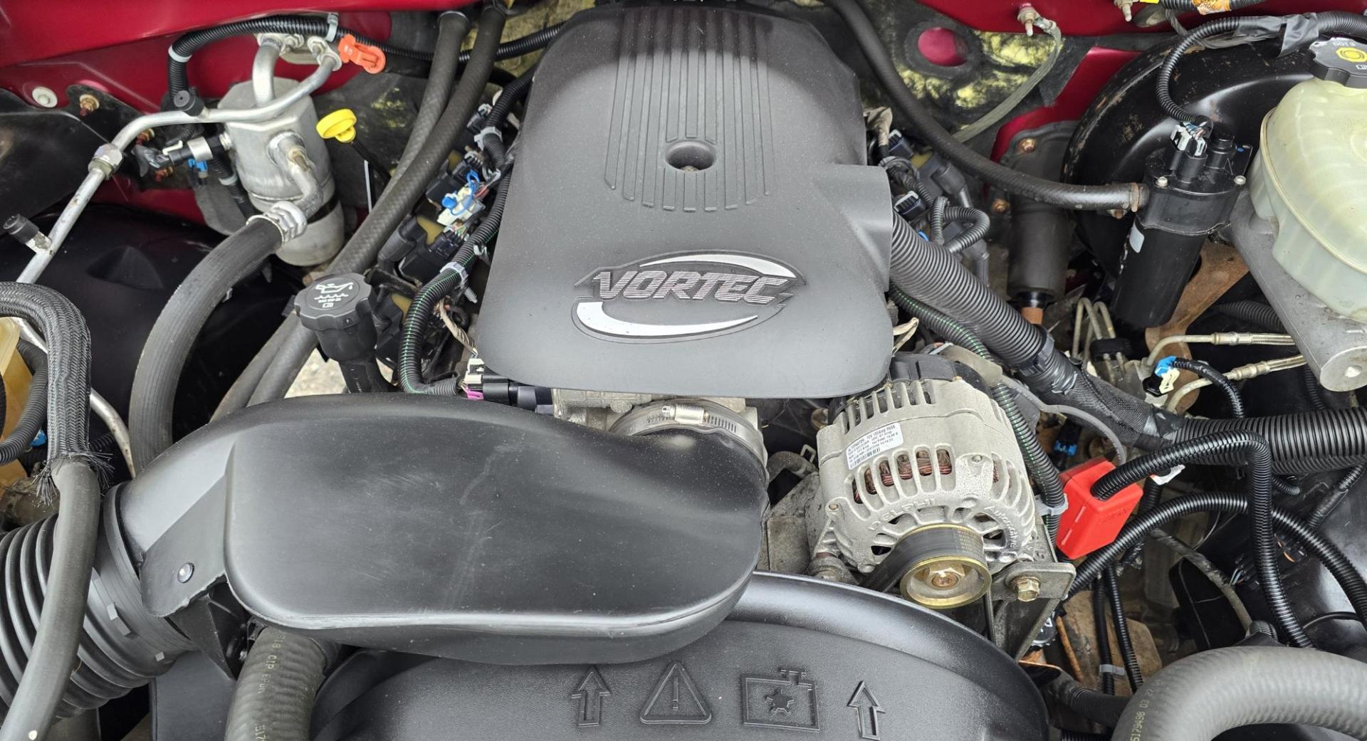 2004 Maroon /Tan Chevrolet Silverado 1500 LS Crew Cab 4WD (2GCEK13T741) with an 5.3L V8 OHV 16V engine, 4-Speed Automatic Overdrive transmission, located at 450 N Russell, Missoula, MT, 59801, (406) 543-6600, 46.874496, -114.017433 - Strong Running 4WD Chevy. 5.3L V8 Engine. Automatic Transmission. Heated Leather Power Front Seats. Rear DVD Player. Power Windows and Locks. AM FM CD Player.Running Boards. Has a check engine light saying there is a misfire but the truck runs great. Does have a Branded Title because the State of Mo - Photo#17