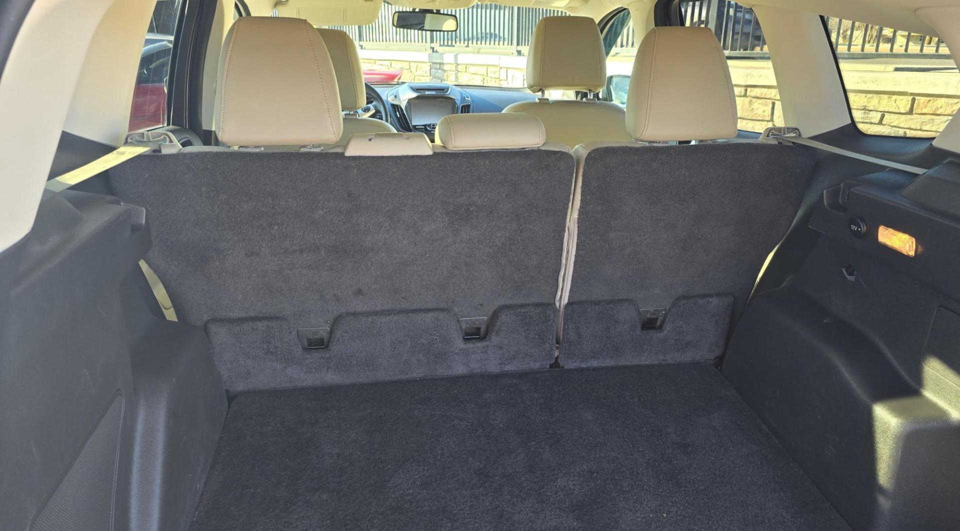 2014 White /Tan Ford Escape Titanium FWD (1FMCU0J95EU) with an 2.0L L4 DOHC 16V engine, 6-Speed Automatic transmission, located at 450 N Russell, Missoula, MT, 59801, (406) 543-6600, 46.874496, -114.017433 - Straight little SUV with a 2.0L I4 Eco Boost Engine. 6 Speed Select Shift Automatic Transmission. Navigation. Heated Leather Seats. Power Drivers Seat. Backup Camera. Blind Spot Detection System. Power Windows and Locks. Power Rear Lift Gate. Sync Voice Activated System. Bluetooth Audio and Phone. A - Photo#8