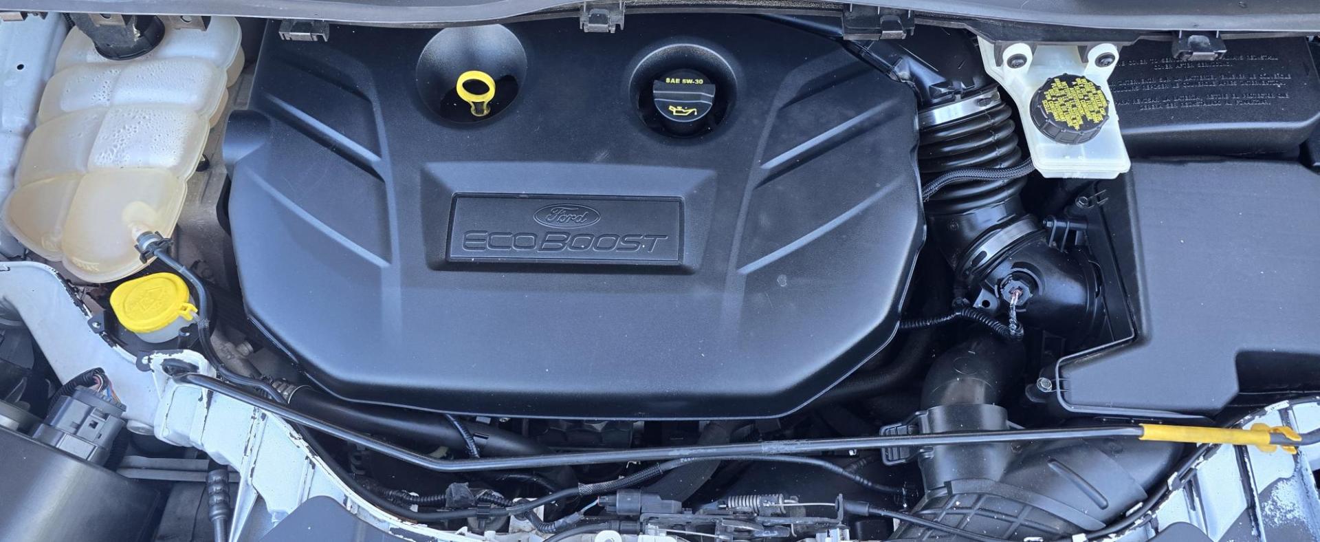 2014 White /Tan Ford Escape Titanium FWD (1FMCU0J95EU) with an 2.0L L4 DOHC 16V engine, 6-Speed Automatic transmission, located at 450 N Russell, Missoula, MT, 59801, (406) 543-6600, 46.874496, -114.017433 - Straight little SUV with a 2.0L I4 Eco Boost Engine. 6 Speed Select Shift Automatic Transmission. Navigation. Heated Leather Seats. Power Drivers Seat. Backup Camera. Blind Spot Detection System. Power Windows and Locks. Power Rear Lift Gate. Sync Voice Activated System. Bluetooth Audio and Phone. A - Photo#16