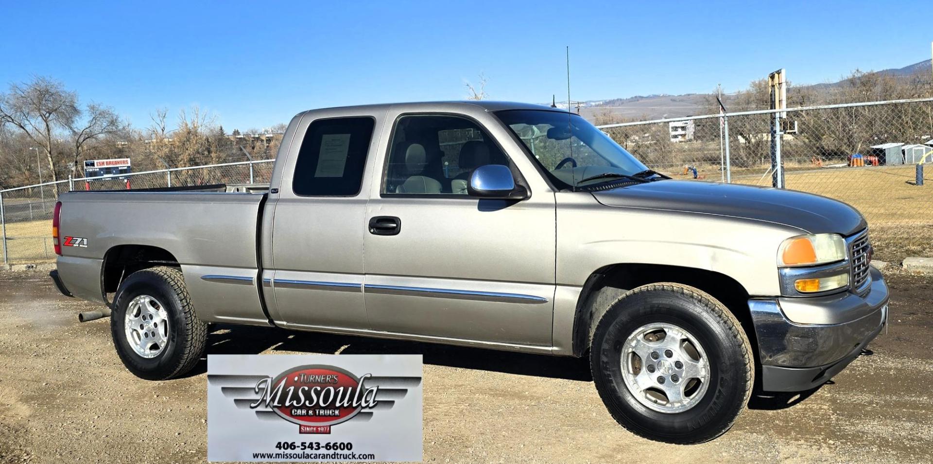 2002 Pewter /Gray GMC Sierra 1500 SLT Ext. Cab 4WD (1GTEK19T52E) with an 5.3L V8 OHV 16V engine, 4-Speed Automatic Overdrive transmission, located at 450 N Russell, Missoula, MT, 59801, (406) 543-6600, 46.874496, -114.017433 - Clean 3 Owner 4WD Chevy. 5.3L V8 Engine. Automatic Transmission. Air. Cruise. Tilt. Power Windows and Locks. Leather Memory Seats. Heated Front Seats. AM FM CD Cassette Player. Truck Runs and drives fantastic. Excellent Tires. Clean Title and Carfax. Because of the age, our lenders do NOT offer - Photo#0