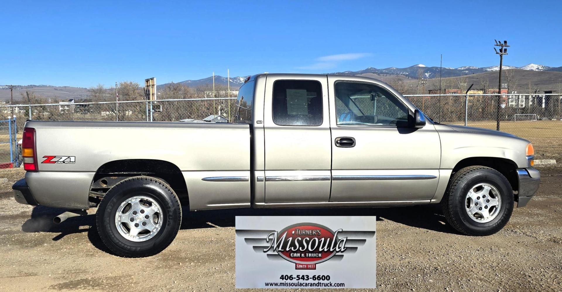 2002 Pewter /Gray GMC Sierra 1500 SLT Ext. Cab 4WD (1GTEK19T52E) with an 5.3L V8 OHV 16V engine, 4-Speed Automatic Overdrive transmission, located at 450 N Russell, Missoula, MT, 59801, (406) 543-6600, 46.874496, -114.017433 - Clean 3 Owner 4WD Chevy. 5.3L V8 Engine. Automatic Transmission. Air. Cruise. Tilt. Power Windows and Locks. Leather Memory Seats. Heated Front Seats. AM FM CD Cassette Player. Truck Runs and drives fantastic. Excellent Tires. Clean Title and Carfax. Because of the age, our lenders do NOT offer - Photo#1
