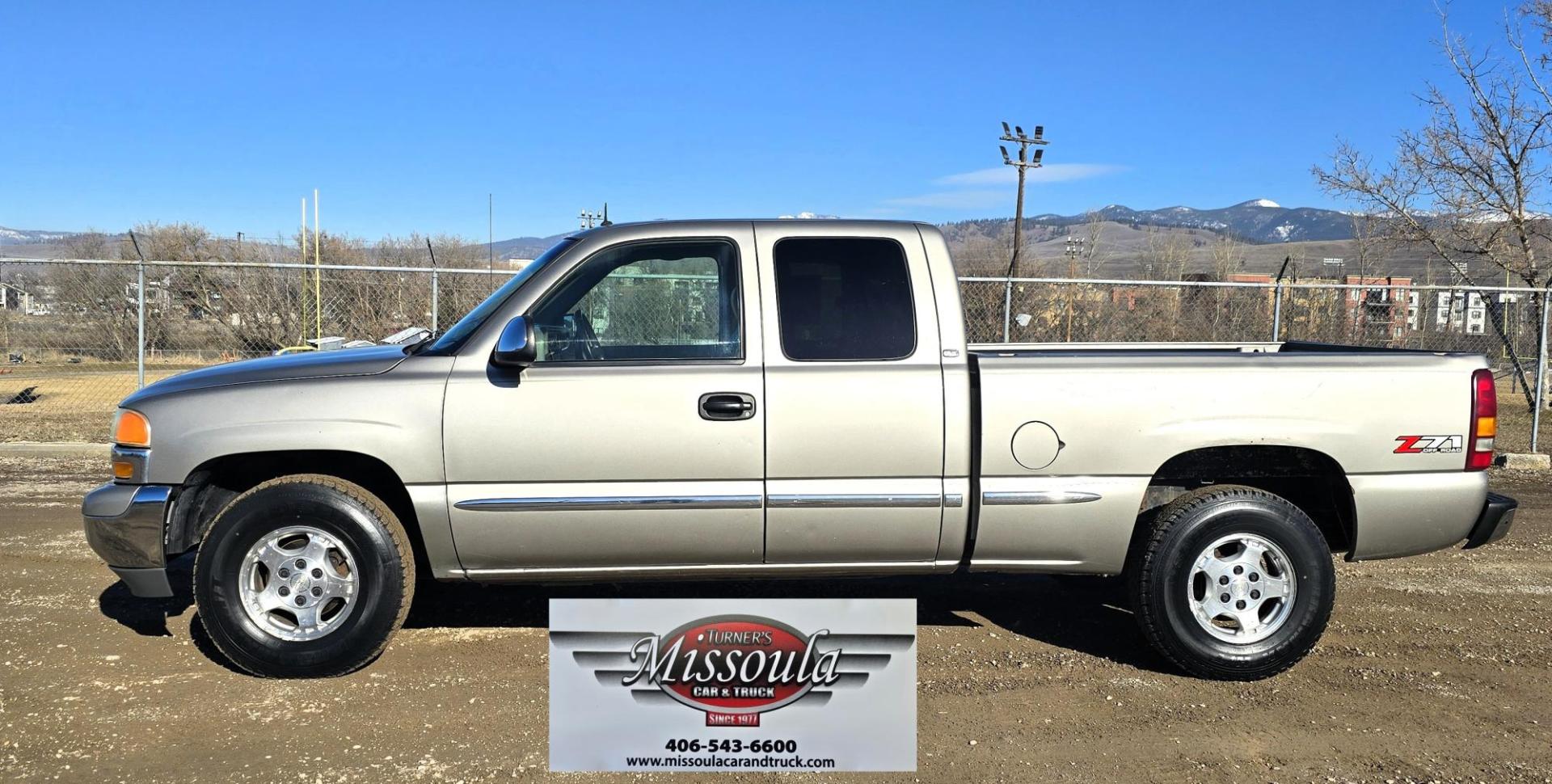 2002 Pewter /Gray GMC Sierra 1500 SLT Ext. Cab 4WD (1GTEK19T52E) with an 5.3L V8 OHV 16V engine, 4-Speed Automatic Overdrive transmission, located at 450 N Russell, Missoula, MT, 59801, (406) 543-6600, 46.874496, -114.017433 - Clean 3 Owner 4WD Chevy. 5.3L V8 Engine. Automatic Transmission. Air. Cruise. Tilt. Power Windows and Locks. Leather Memory Seats. Heated Front Seats. AM FM CD Cassette Player. Truck Runs and drives fantastic. Excellent Tires. Clean Title and Carfax. Because of the age, our lenders do NOT offer - Photo#3