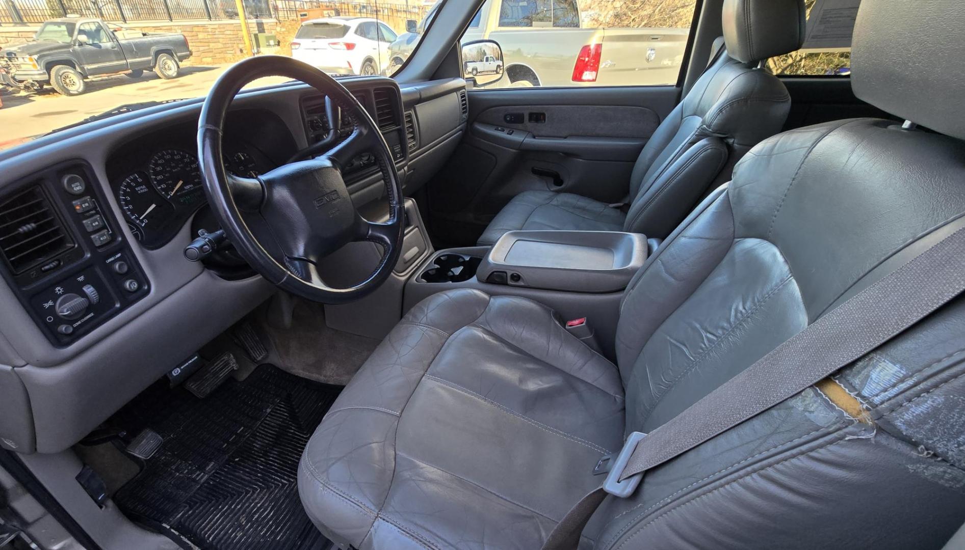 2002 Pewter /Gray GMC Sierra 1500 SLT Ext. Cab 4WD (1GTEK19T52E) with an 5.3L V8 OHV 16V engine, 4-Speed Automatic Overdrive transmission, located at 450 N Russell, Missoula, MT, 59801, (406) 543-6600, 46.874496, -114.017433 - Clean 3 Owner 4WD Chevy. 5.3L V8 Engine. Automatic Transmission. Air. Cruise. Tilt. Power Windows and Locks. Leather Memory Seats. Heated Front Seats. AM FM CD Cassette Player. Truck Runs and drives fantastic. Excellent Tires. Clean Title and Carfax. Because of the age, our lenders do NOT offer - Photo#14