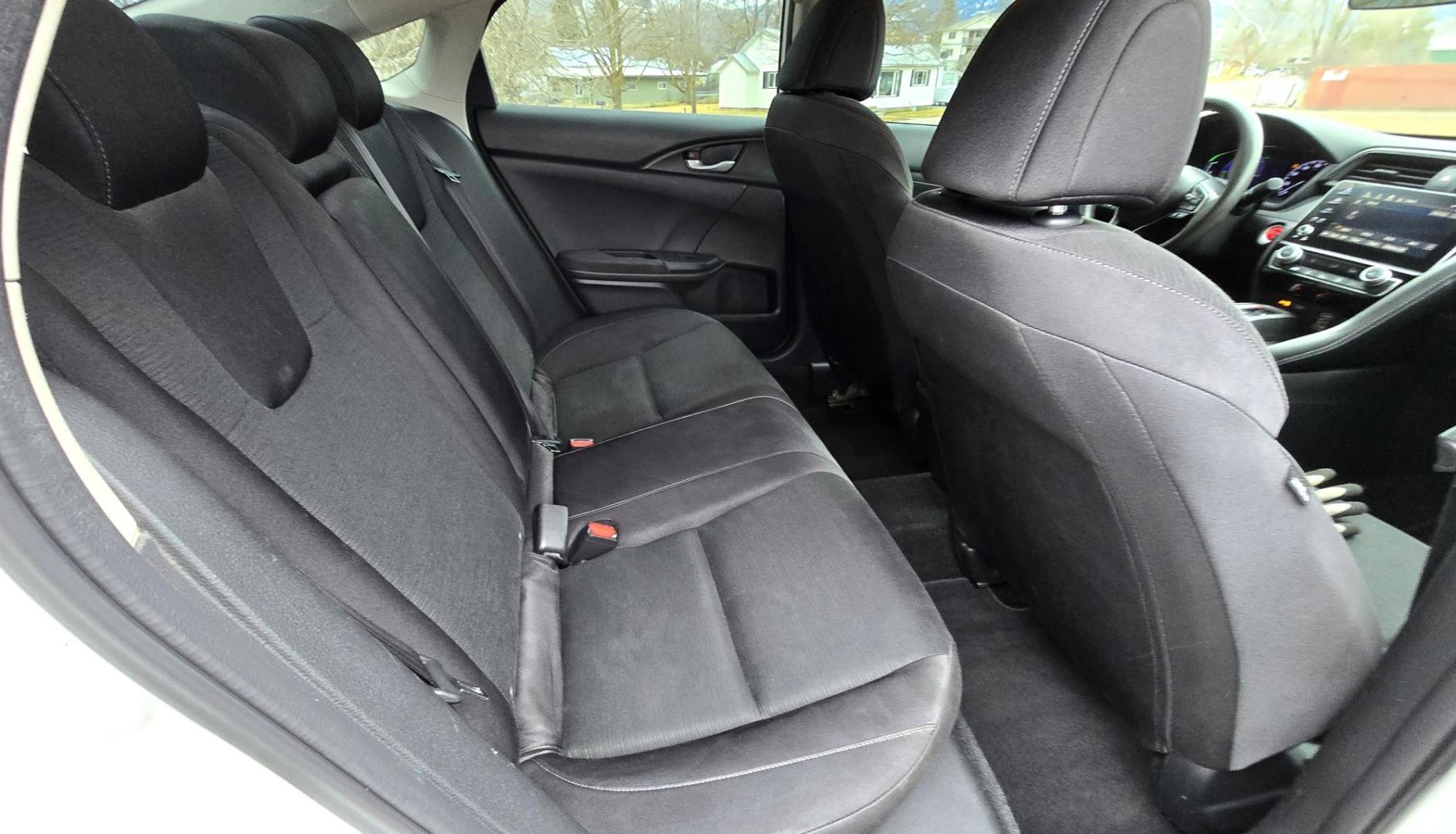 2019 White /Black Honda Insight EX Hybrid (19XZE4F5XKE) with an 1.5L L4 DOHC 16V engine, CVT transmission, located at 450 N Russell, Missoula, MT, 59801, (406) 543-6600, 46.874496, -114.017433 - Sleek Looking Hybrid. yes it's high miles but runs amazing. 1.5L Hybrid Engine. Automatic Transmission. Front Wheel Drive. Air. Cruise. Tilt. Power Windows and Locks. Remote Start. AM FM SAT. Bluetooth Audio and Phone Connection. Touch Screen. Tires are like new. Sell below Book. Because of the - Photo#9