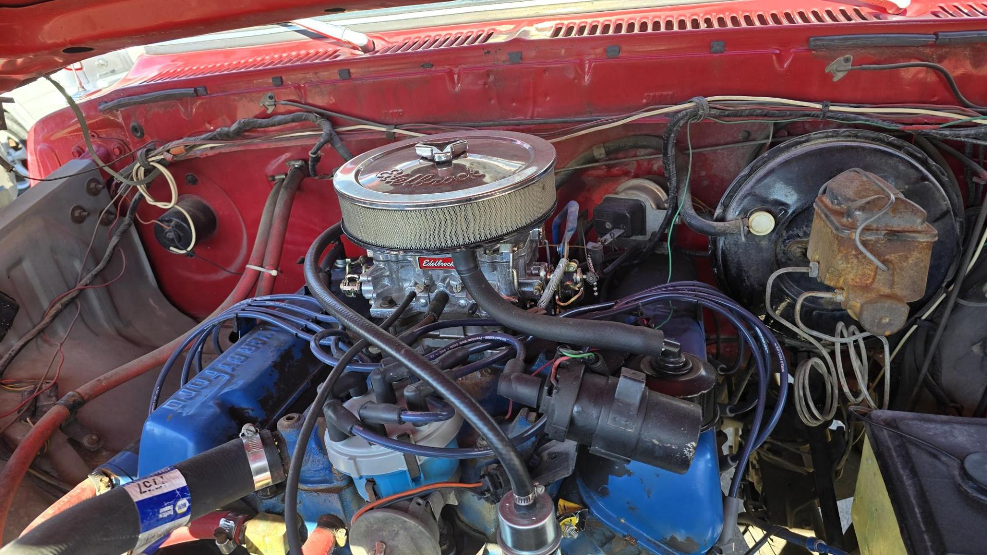 1979 Red and Silver /Red Ford F-250 F250 Ranger (F15JREG8225) with an 460 V8 engine, Automatic transmission, located at 450 N Russell, Missoula, MT, 59801, (406) 543-6600, 46.874496, -114.017433 - This sharp-looking classic Ford pickup offers a unique blend of components. Although the title lists it as an F150 due to a cab replacement—the new cab being a 1/2 ton with an F150 VIN number—the rest of the vehicle is in fact an F250. All major features including badges, suspension and frame ar - Photo#23