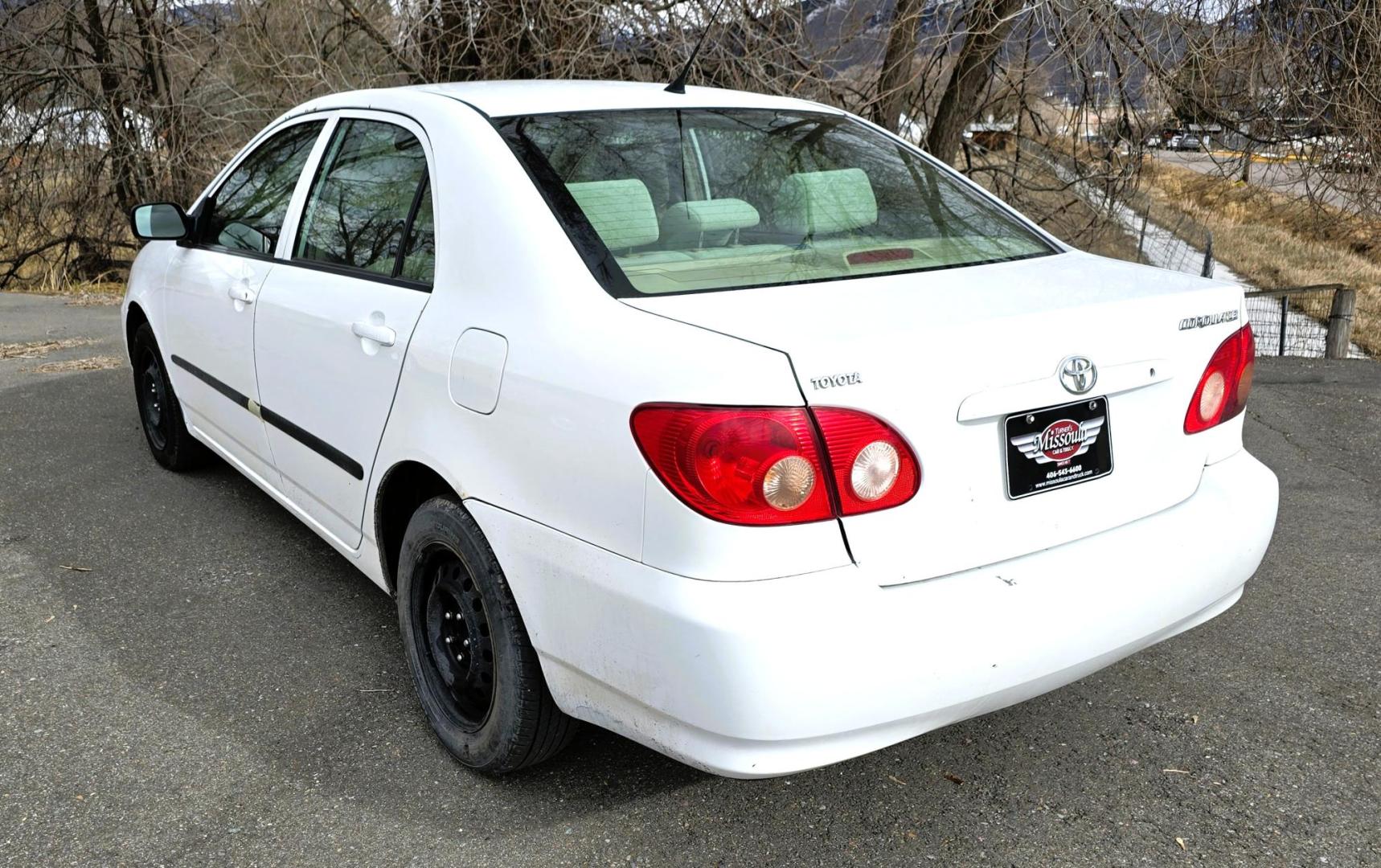 2007 White /Gray Toyota Corolla CE (JTDBR32E170) with an 1.8L L4 DOHC 16V engine, Automatic transmission, located at 450 N Russell, Missoula, MT, 59801, (406) 543-6600, 46.874496, -114.017433 - Looking for Fuel Economy at a reasonable price? Look no further. 2007 Toyota Corolla with a 1.8L I4 Engine. Automatic Transmission. Front Wheel Drive. Power Windows and Locks. Seats are in excellent condition and very comfortable. Air. Cruise. Tilt. New Brakes all around. Does have a Branded Title b - Photo#4