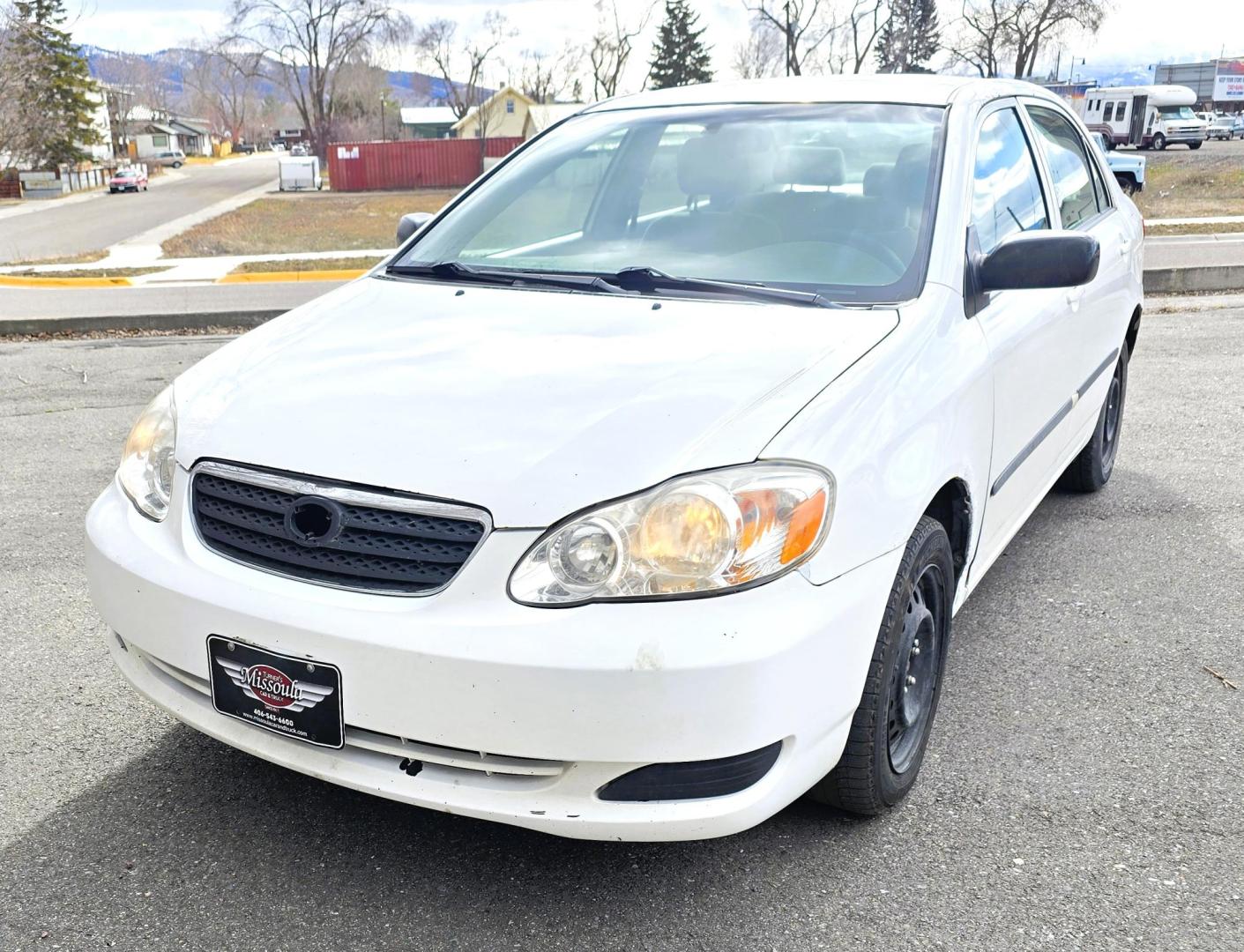 2007 White /Gray Toyota Corolla CE (JTDBR32E170) with an 1.8L L4 DOHC 16V engine, Automatic transmission, located at 450 N Russell, Missoula, MT, 59801, (406) 543-6600, 46.874496, -114.017433 - Looking for Fuel Economy at a reasonable price? Look no further. 2007 Toyota Corolla with a 1.8L I4 Engine. Automatic Transmission. Front Wheel Drive. Power Windows and Locks. Seats are in excellent condition and very comfortable. Air. Cruise. Tilt. New Brakes all around. Does have a Branded Title b - Photo#3