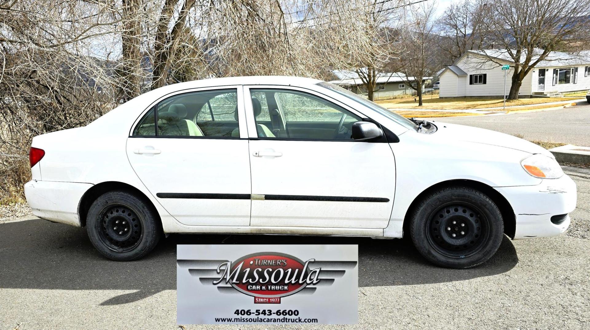 2007 White /Gray Toyota Corolla CE (JTDBR32E170) with an 1.8L L4 DOHC 16V engine, Automatic transmission, located at 450 N Russell, Missoula, MT, 59801, (406) 543-6600, 46.874496, -114.017433 - Looking for Fuel Economy at a reasonable price? Look no further. 2007 Toyota Corolla with a 1.8L I4 Engine. Automatic Transmission. Front Wheel Drive. Power Windows and Locks. Seats are in excellent condition and very comfortable. Air. Cruise. Tilt. New Brakes all around. Does have a Branded Title b - Photo#5
