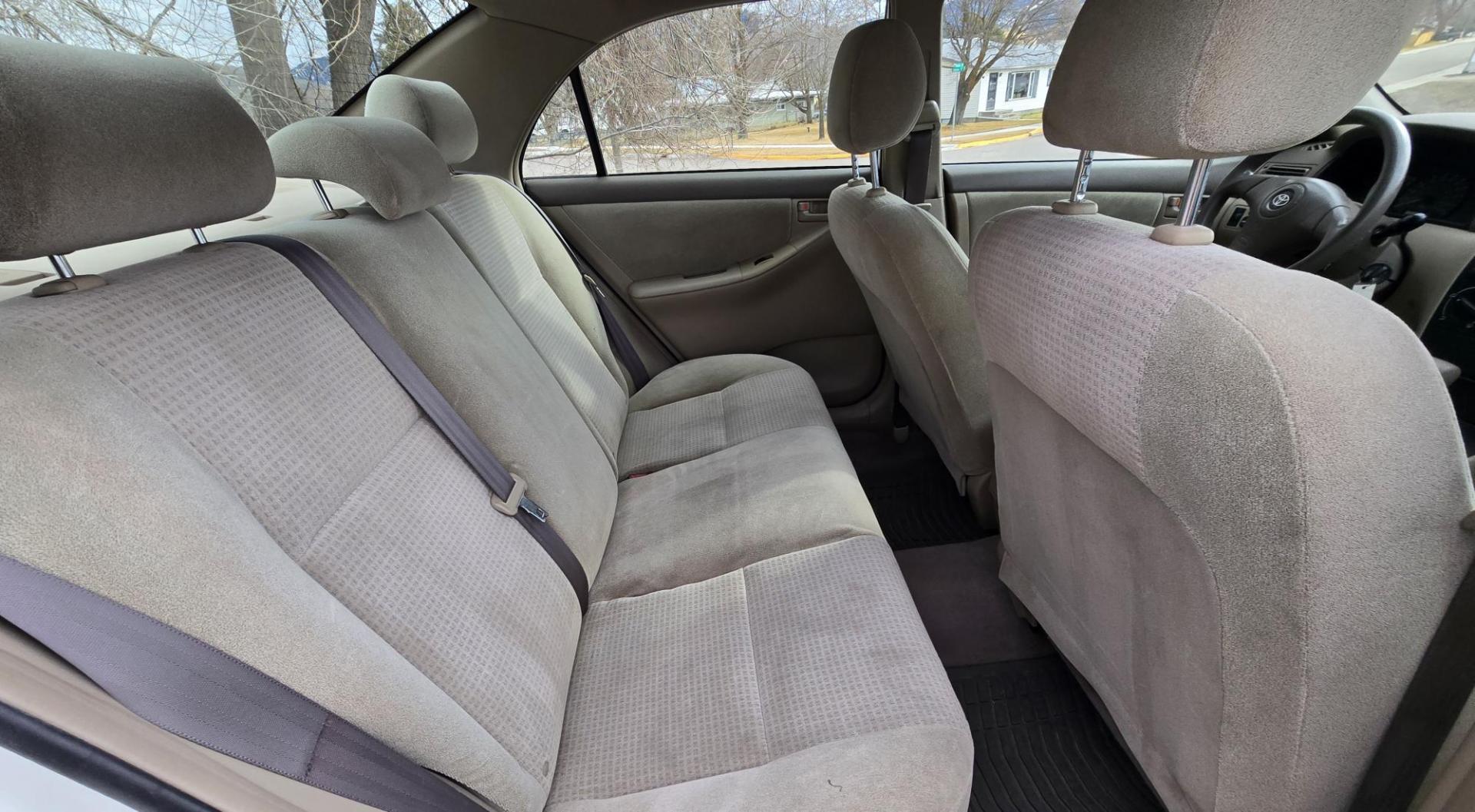 2007 White /Gray Toyota Corolla CE (JTDBR32E170) with an 1.8L L4 DOHC 16V engine, Automatic transmission, located at 450 N Russell, Missoula, MT, 59801, (406) 543-6600, 46.874496, -114.017433 - Looking for Fuel Economy at a reasonable price? Look no further. 2007 Toyota Corolla with a 1.8L I4 Engine. Automatic Transmission. Front Wheel Drive. Power Windows and Locks. Seats are in excellent condition and very comfortable. Air. Cruise. Tilt. New Brakes all around. Does have a Branded Title b - Photo#8