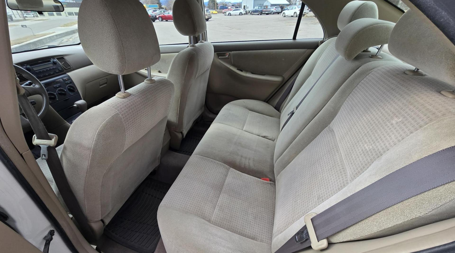 2007 White /Gray Toyota Corolla CE (JTDBR32E170) with an 1.8L L4 DOHC 16V engine, Automatic transmission, located at 450 N Russell, Missoula, MT, 59801, (406) 543-6600, 46.874496, -114.017433 - Looking for Fuel Economy at a reasonable price? Look no further. 2007 Toyota Corolla with a 1.8L I4 Engine. Automatic Transmission. Front Wheel Drive. Power Windows and Locks. Seats are in excellent condition and very comfortable. Air. Cruise. Tilt. New Brakes all around. Does have a Branded Title b - Photo#10