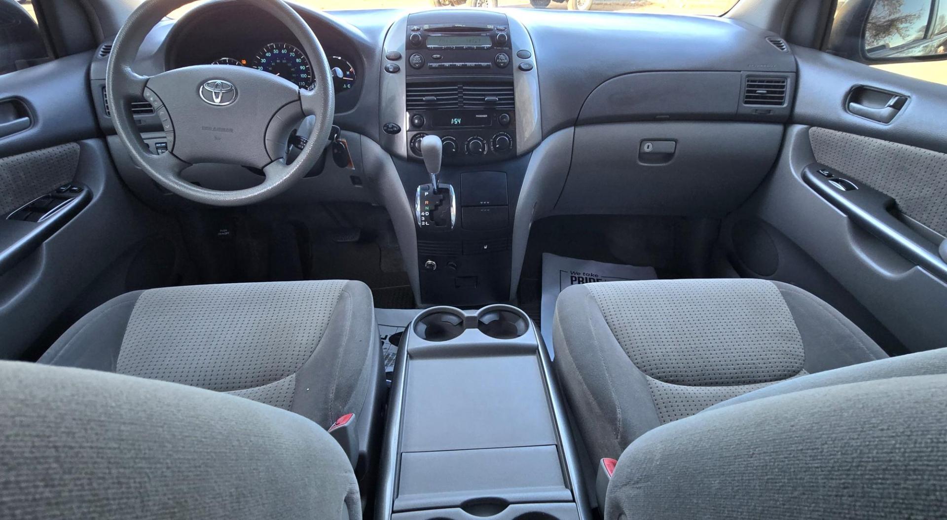 2009 Green /Gray Toyota Sienna CE FWD 7-Passenger (5TDZK23C29S) with an 3.5L V6 EFI DOHC 24V engine, 5-Speed Automatic transmission, located at 450 N Russell, Missoula, MT, 59801, (406) 543-6600, 46.874496, -114.017433 - One of the nicer vehicles we have on the lot. Clean, Straight and Drives like a Dream. It's in such excellent condition it's hard to believe it has a Salvage Title. After a minor accident in 2017, the Insurance Company declared it a total loss. The minor damage was repaired and this Van is exception - Photo#12