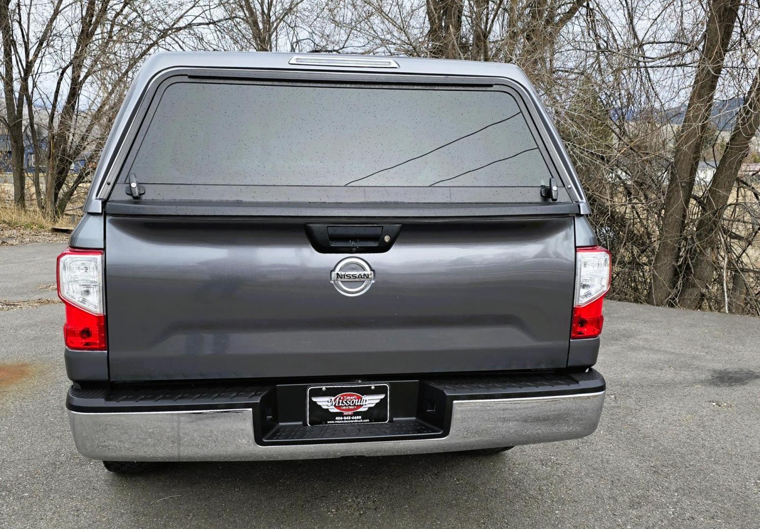 2018 Grey /Gray Nissan Titan S Crew Cab 4WD (1N6AA1EJ5JN) with an 5.6L V8 DOHC 32V engine, 6 Speed Automatic transmission, located at 450 N Russell, Missoula, MT, 59801, (406) 543-6600, 46.874496, -114.017433 - 2018 Nissan Titan 4WD with powerful 5.7L V8 Engine. 6 Speed Automatic Transmission. Nice Topper with a Decked Brand Slide out tool Box. Air. Cruise. Tilt. AM FM CD PLayer with Bluetooth Audio and Phone Connection. Backup Camera. New Tires. Towing. Running Boards. Clean Title and Carfax. We Finan - Photo#3