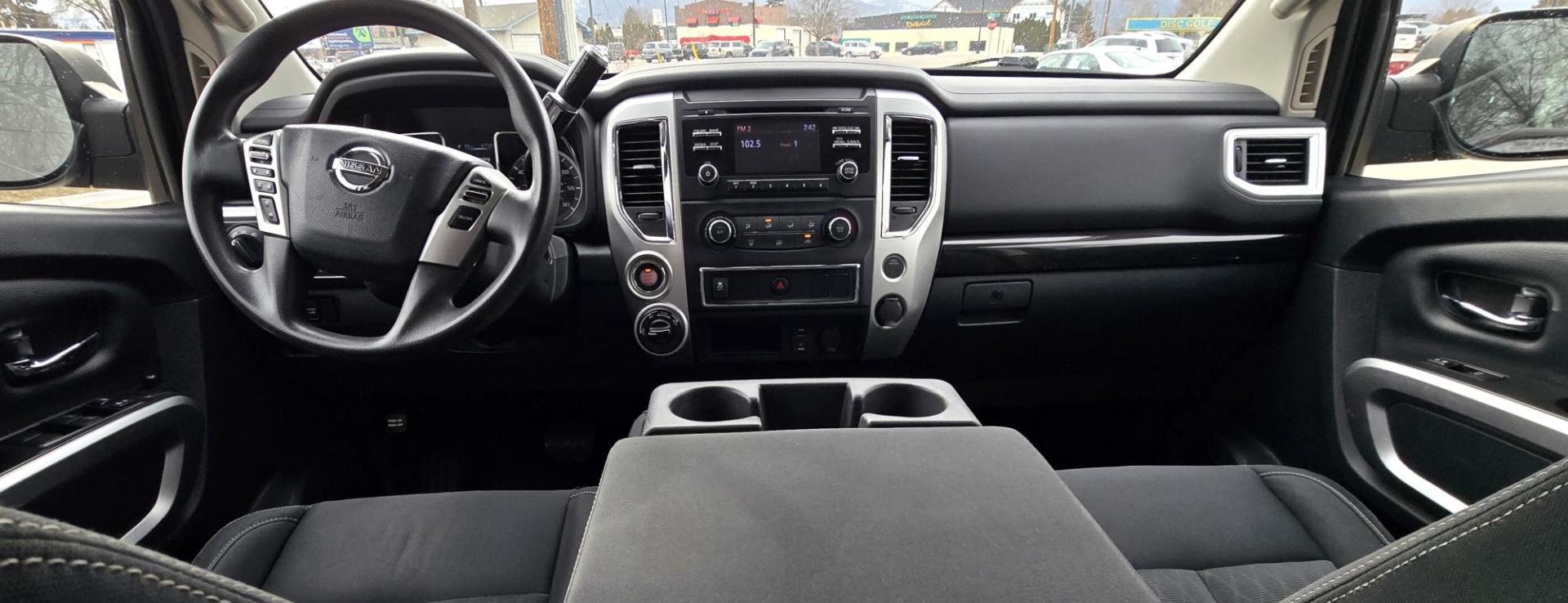 2018 Grey /Gray Nissan Titan S Crew Cab 4WD (1N6AA1EJ5JN) with an 5.6L V8 DOHC 32V engine, 6 Speed Automatic transmission, located at 450 N Russell, Missoula, MT, 59801, (406) 543-6600, 46.874496, -114.017433 - 2018 Nissan Titan 4WD with powerful 5.7L V8 Engine. 6 Speed Automatic Transmission. Nice Topper with a Decked Brand Slide out tool Box. Air. Cruise. Tilt. AM FM CD PLayer with Bluetooth Audio and Phone Connection. Backup Camera. New Tires. Towing. Running Boards. Clean Title and Carfax. We Finan - Photo#13
