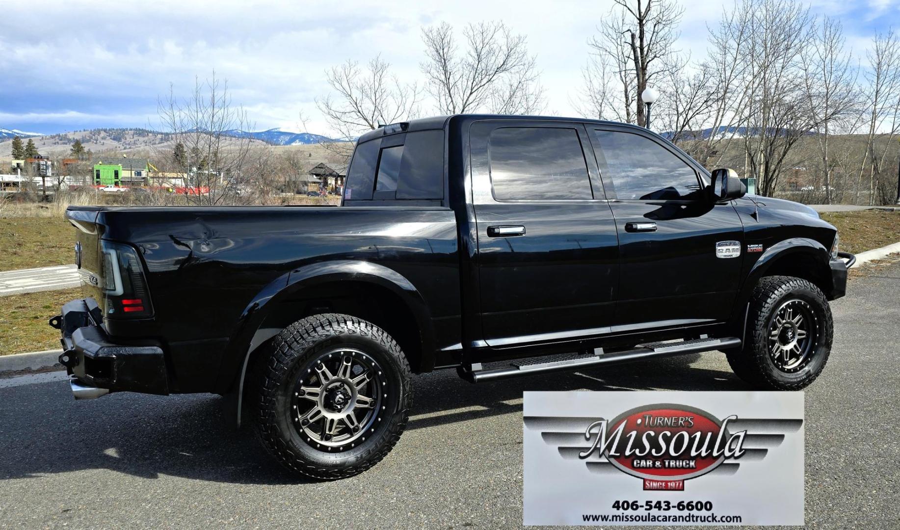 2013 Black /Brown RAM 1500 Laramie Longhorn Laramie Longhorn (1C6RR7PTXDS) with an 5.7L V8 engine, Automatic transmission, located at 450 N Russell, Missoula, MT, 59801, (406) 543-6600, 46.874496, -114.017433 - Photo#5