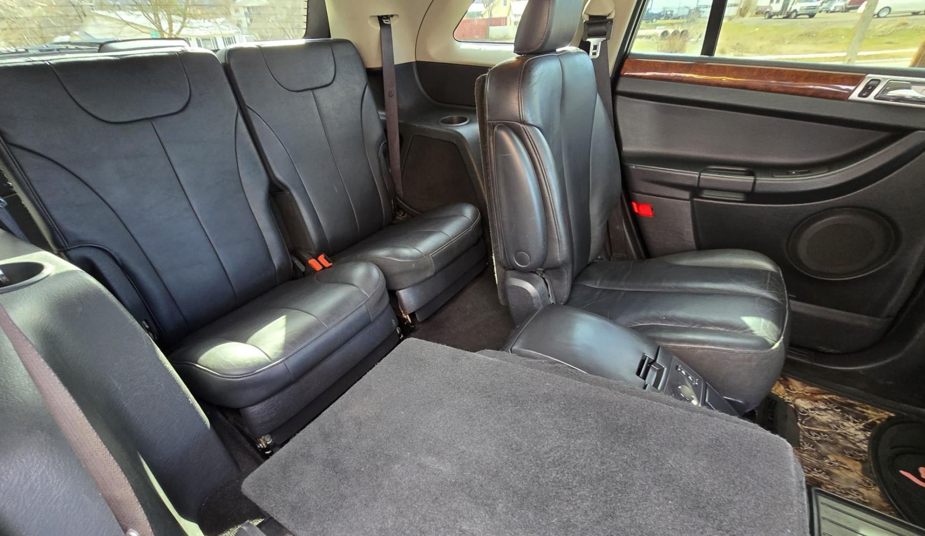 2005 Green /Black Chrysler Pacifica Touring Touring (2C8GF68405R) with an 3.5L V6 engine, Automatic Transmission transmission, located at 450 N Russell, Missoula, MT, 59801, (406) 543-6600, 46.874496, -114.017433 - Nice AWD SUV. 3.5L V6 Engine. Power Heated Leather Front Seats. Heated Middle Seats. 6 CD Changer. Power Sunroof. Air. Cruise. Tilt. Power Windows and Locks. 3rd Row Seating. Clean Title and Carfax. Because of the age, our lender do NOT offer financing. - Photo#10