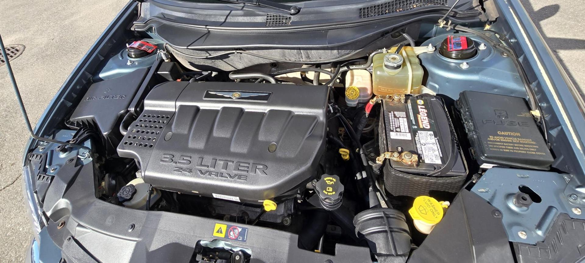 2005 Green /Black Chrysler Pacifica Touring Touring (2C8GF68405R) with an 3.5L V6 engine, Automatic Transmission transmission, located at 450 N Russell, Missoula, MT, 59801, (406) 543-6600, 46.874496, -114.017433 - Nice AWD SUV. 3.5L V6 Engine. Power Heated Leather Front Seats. Heated Middle Seats. 6 CD Changer. Power Sunroof. Air. Cruise. Tilt. Power Windows and Locks. 3rd Row Seating. Clean Title and Carfax. Because of the age, our lender do NOT offer financing. - Photo#21