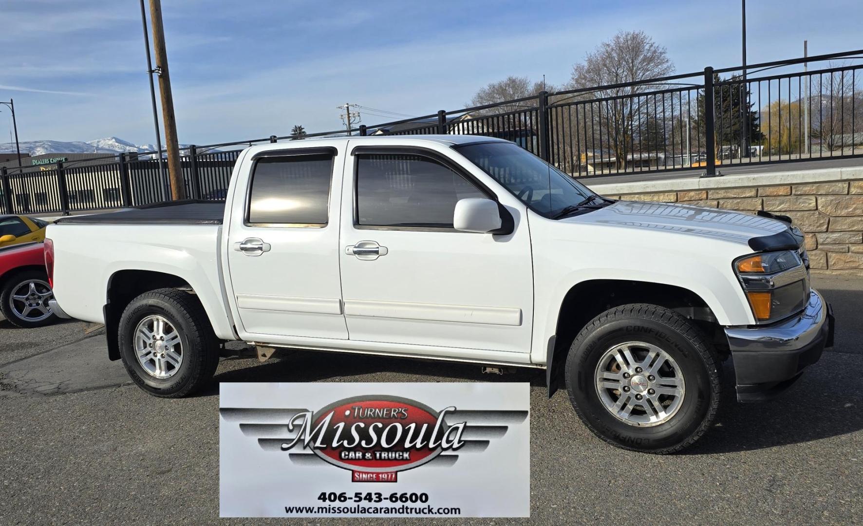 2011 White /Black GMC Canyon SLE Crew Cab 4WD (1GTH6MFE1B8) with an 3.7L L5 DOHC 20V engine, Automatic transmission, located at 450 N Russell, Missoula, MT, 59801, (406) 543-6600, 46.874496, -114.017433 - Very Desirable Sized 4WD Pickup. 3.7L I5 Engine. Automatic Transmission. Air. Cruise. Tilt. Power Windows and Locks. Tonnreau Cover. Excellent Tread Tires. Clean Title and Carfax. We Finance through local Credit Unions. We do NOT offer In House (Buy Here Pay Here) Financing. - Photo#2