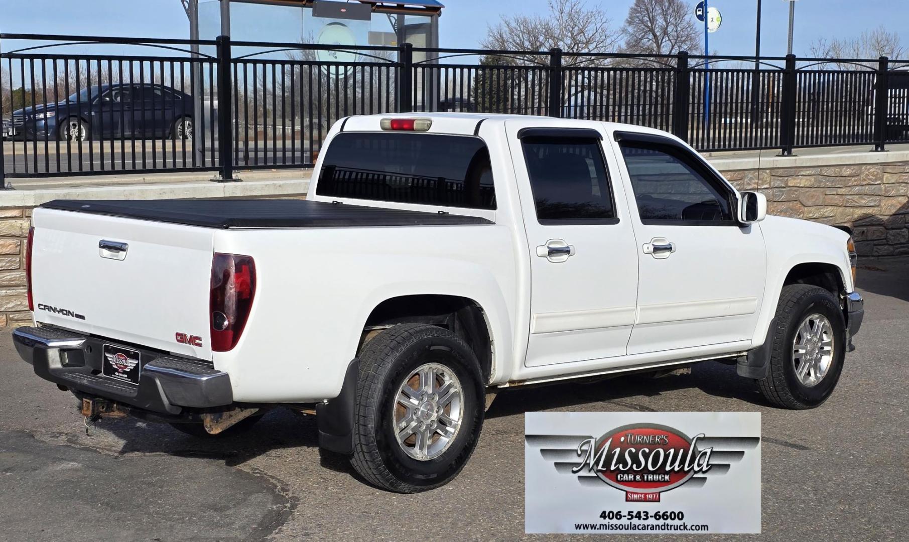 2011 White /Black GMC Canyon SLE Crew Cab 4WD (1GTH6MFE1B8) with an 3.7L L5 DOHC 20V engine, Automatic transmission, located at 450 N Russell, Missoula, MT, 59801, (406) 543-6600, 46.874496, -114.017433 - Very Desirable Sized 4WD Pickup. 3.7L I5 Engine. Automatic Transmission. Air. Cruise. Tilt. Power Windows and Locks. Tonnreau Cover. Excellent Tread Tires. Clean Title and Carfax. We Finance through local Credit Unions. We do NOT offer In House (Buy Here Pay Here) Financing. - Photo#1