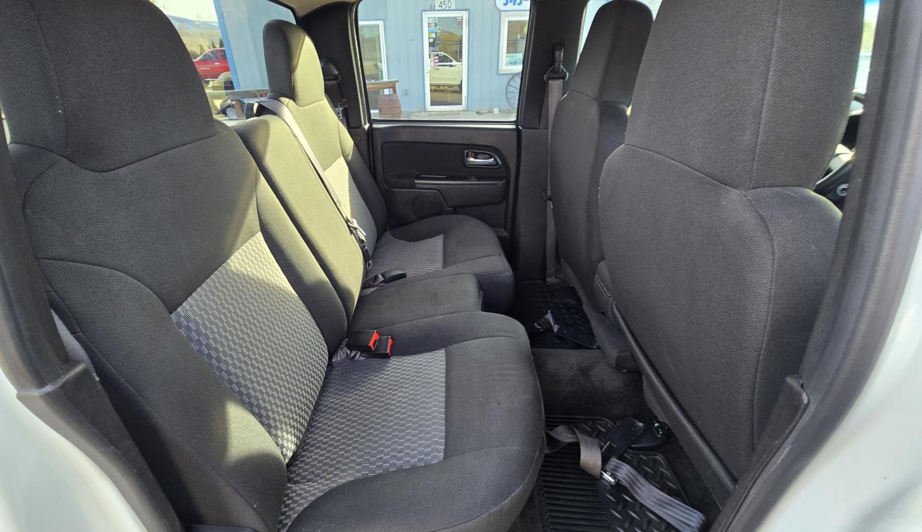 2011 White /Black GMC Canyon SLE Crew Cab 4WD (1GTH6MFE1B8) with an 3.7L L5 DOHC 20V engine, Automatic transmission, located at 450 N Russell, Missoula, MT, 59801, (406) 543-6600, 46.874496, -114.017433 - Very Desirable Sized 4WD Pickup. 3.7L I5 Engine. Automatic Transmission. Air. Cruise. Tilt. Power Windows and Locks. Tonnreau Cover. Excellent Tread Tires. Clean Title and Carfax. We Finance through local Credit Unions. We do NOT offer In House (Buy Here Pay Here) Financing. - Photo#9