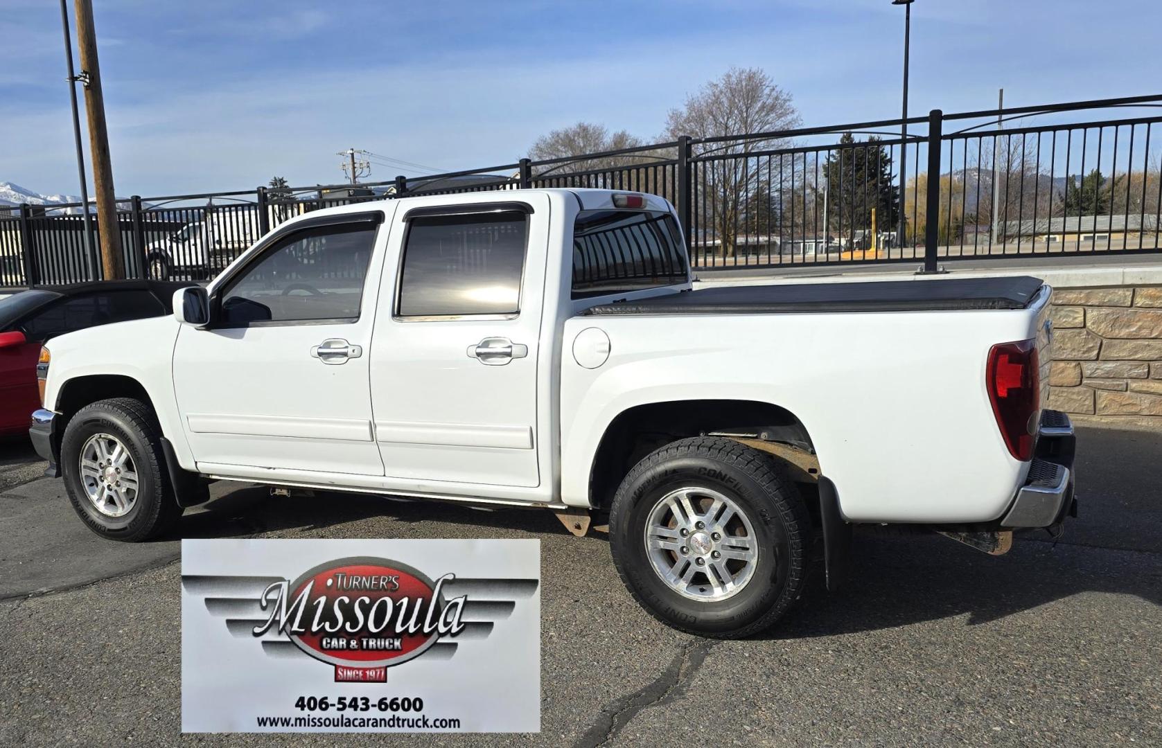 2011 White /Black GMC Canyon SLE Crew Cab 4WD (1GTH6MFE1B8) with an 3.7L L5 DOHC 20V engine, Automatic transmission, located at 450 N Russell, Missoula, MT, 59801, (406) 543-6600, 46.874496, -114.017433 - Very Desirable Sized 4WD Pickup. 3.7L I5 Engine. Automatic Transmission. Air. Cruise. Tilt. Power Windows and Locks. Tonnreau Cover. Excellent Tread Tires. Clean Title and Carfax. We Finance through local Credit Unions. We do NOT offer In House (Buy Here Pay Here) Financing. - Photo#7
