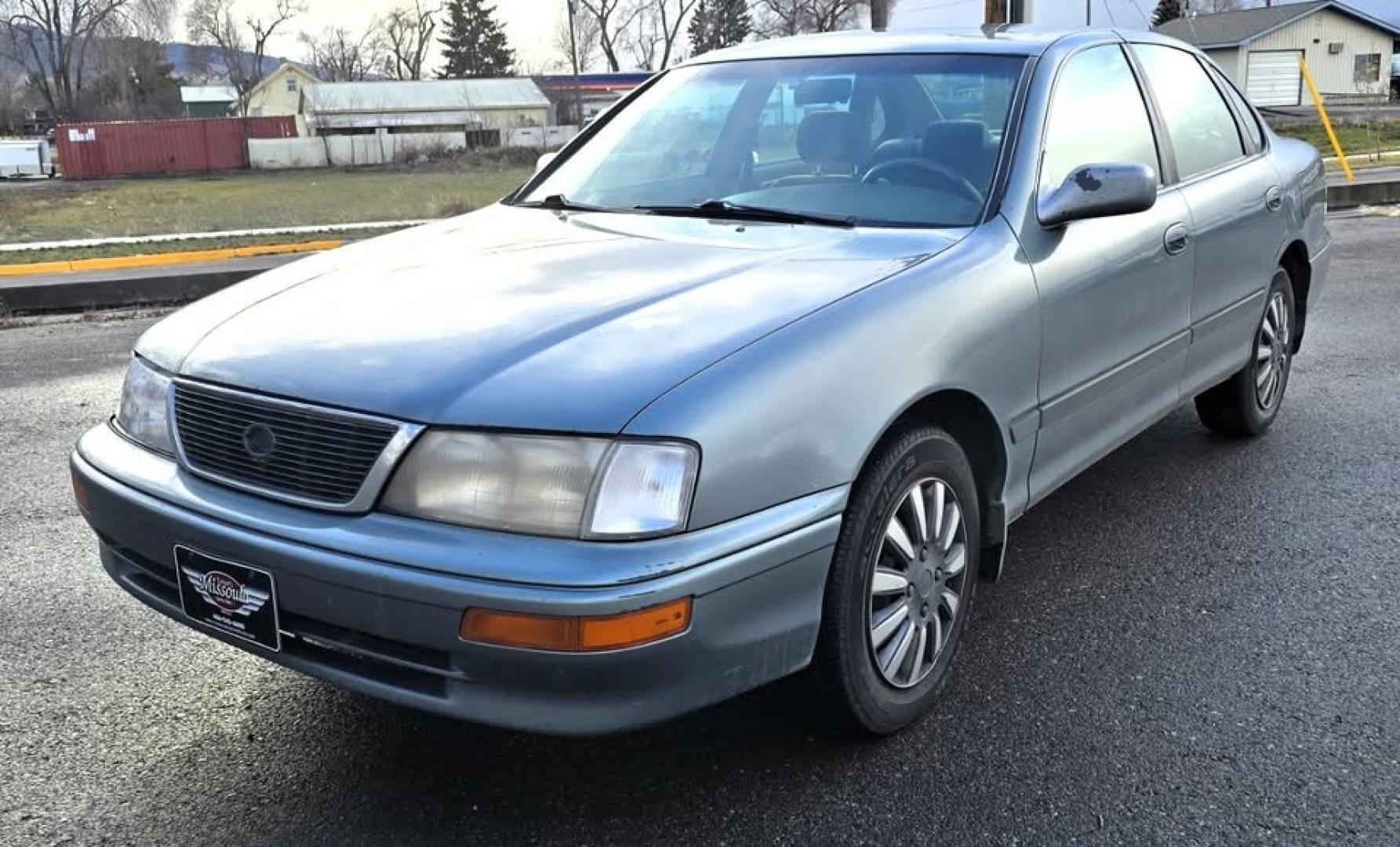 1997 Green /Tan Toyota Avalon XL (4T1BF12BXVU) with an 3.0L V6 SOHC 24V engine, 4-Speed Automatic Overdrive transmission, located at 450 N Russell, Missoula, MT, 59801, (406) 543-6600, 46.874496, -114.017433 - 1997 Toyota Avalon XL. 3.0L V6 Engine Runs Great. Automatic Transmission. Air Cruise. Tilt. Power Windows and Locks. Lots of miles but you wouldn't know it but the condition and how well it drives. Two Owner with no accidents. Clean Title and Carfax. Has a P0773 Check Engine Light. "Shift Solenoid" - Photo#3