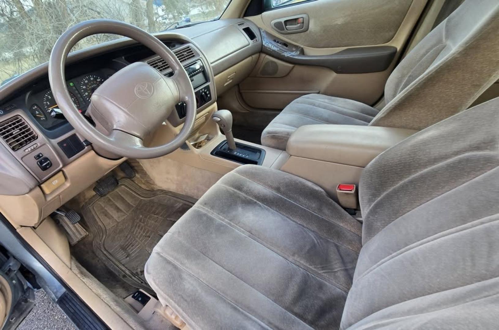 1997 Green /Tan Toyota Avalon XL (4T1BF12BXVU) with an 3.0L V6 SOHC 24V engine, 4-Speed Automatic Overdrive transmission, located at 450 N Russell, Missoula, MT, 59801, (406) 543-6600, 46.874496, -114.017433 - 1997 Toyota Avalon XL. 3.0L V6 Engine Runs Great. Automatic Transmission. Air Cruise. Tilt. Power Windows and Locks. Lots of miles but you wouldn't know it but the condition and how well it drives. Two Owner with no accidents. Clean Title and Carfax. Has a P0773 Check Engine Light. "Shift Solenoid" - Photo#8