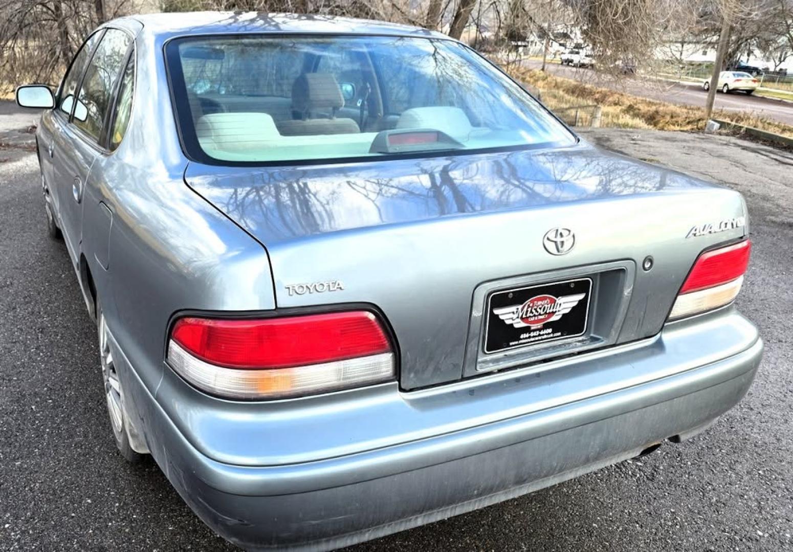 1997 Green /Tan Toyota Avalon XL (4T1BF12BXVU) with an 3.0L V6 SOHC 24V engine, 4-Speed Automatic Overdrive transmission, located at 450 N Russell, Missoula, MT, 59801, (406) 543-6600, 46.874496, -114.017433 - 1997 Toyota Avalon XL. 3.0L V6 Engine Runs Great. Automatic Transmission. Air Cruise. Tilt. Power Windows and Locks. Lots of miles but you wouldn't know it but the condition and how well it drives. Two Owner with no accidents. Clean Title and Carfax. Has a P0773 Check Engine Light. "Shift Solenoid" - Photo#12