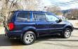 2004 Blue /Black Honda Pilot EX w/ Leather and DVD (2HKYF18664H) with an 3.5L V6 SOHC 24V engine, 5-Speed Automatic Overdrive transmission, located at 450 N Russell, Missoula, MT, 59801, (406) 543-6600, 46.874496, -114.017433 - Great Running AWD Honda. 3.5L V6 Engine. 3rd Row Seating. Heated Front Seats. Power Drivers Seat. Rear Entertainment. Air. Cruise. Tilt. Power Windows and Locks. Remote Start. Has some rust and the front seats are worn. Has an Air Bag Light so we are selling AS-IS. Clean Title and Carfax. No Fina - Photo#3