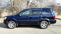 2004 Blue /Black Honda Pilot EX w/ Leather and DVD (2HKYF18664H) with an 3.5L V6 SOHC 24V engine, 5-Speed Automatic Overdrive transmission, located at 450 N Russell, Missoula, MT, 59801, (406) 543-6600, 46.874496, -114.017433 - Great Running AWD Honda. 3.5L V6 Engine. 3rd Row Seating. Heated Front Seats. Power Drivers Seat. Rear Entertainment. Air. Cruise. Tilt. Power Windows and Locks. Remote Start. Has some rust and the front seats are worn. Has an Air Bag Light so we are selling AS-IS. Clean Title and Carfax. No Fina - Photo#1