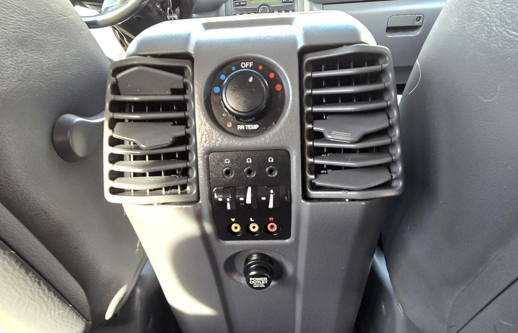 2004 Blue /Black Honda Pilot EX w/ Leather and DVD (2HKYF18664H) with an 3.5L V6 SOHC 24V engine, 5-Speed Automatic Overdrive transmission, located at 450 N Russell, Missoula, MT, 59801, (406) 543-6600, 46.874496, -114.017433 - Great Running AWD Honda. 3.5L V6 Engine. 3rd Row Seating. Heated Front Seats. Power Drivers Seat. Rear Entertainment. Air. Cruise. Tilt. Power Windows and Locks. Remote Start. Has some rust and the front seats are worn. Has an Air Bag Light so we are selling AS-IS. Clean Title and Carfax. No Fina - Photo#10