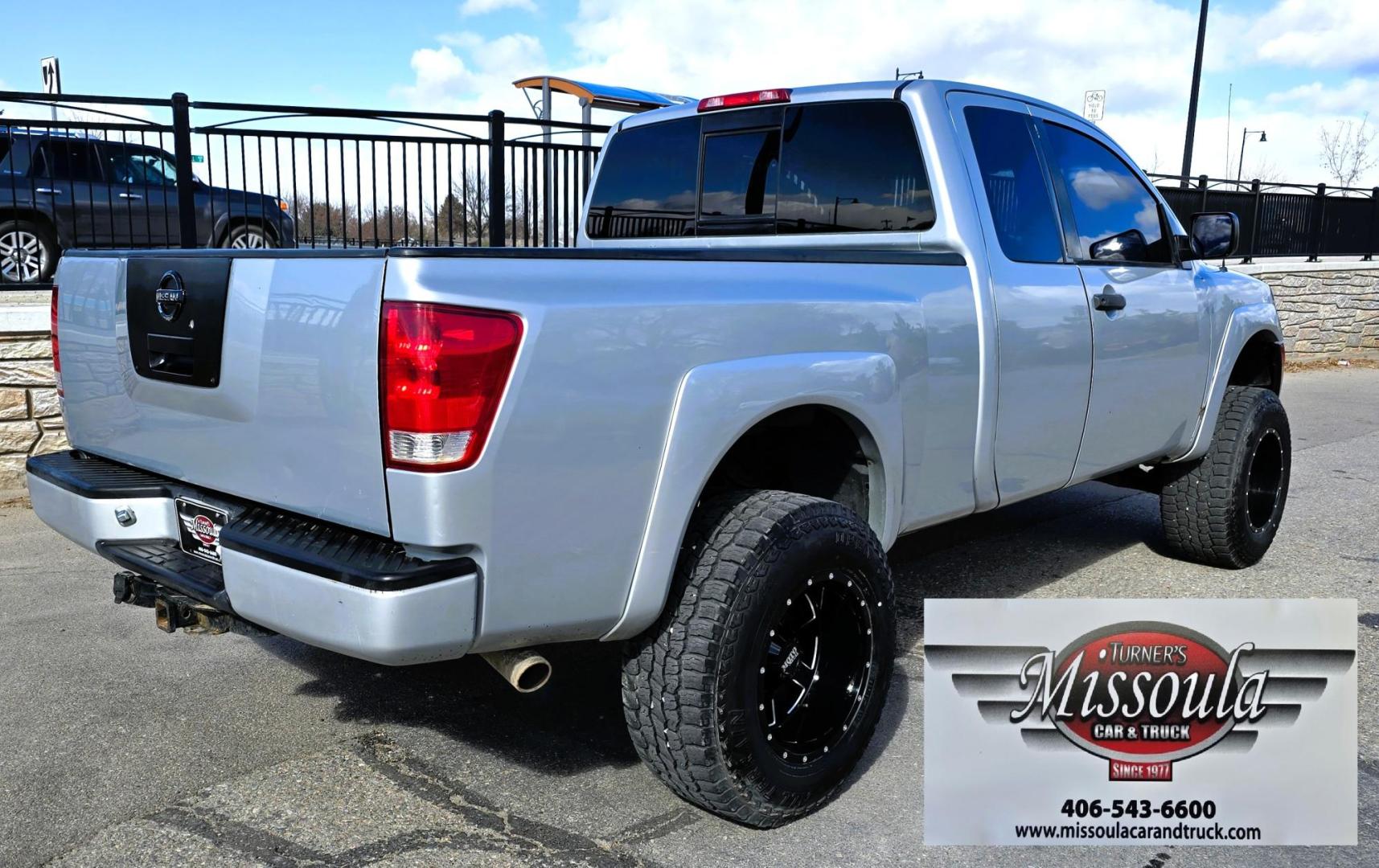 2004 Silver /Black Nissan Titan XE Club Cab 4WD (1N6AA06BX4N) with an 5.6L V8 DOHC 32V engine, 5-Speed Automatic Overdrive transmission, located at 450 N Russell, Missoula, MT, 59801, (406) 543-6600, 46.874496, -114.017433 - Beefy 4WD Nissan Titan with the Powerful 5.6L V8 Engine. Automatic Transmission. Comes with Nice Moto Metal Wheels and Open Range All Terrain Tires. Lifted . Air Conditioning. Aftermarket Kenwood CD Player. Because of the age, our lenders do NOT financing on this Vehicle and we do NOT offer - Photo#4