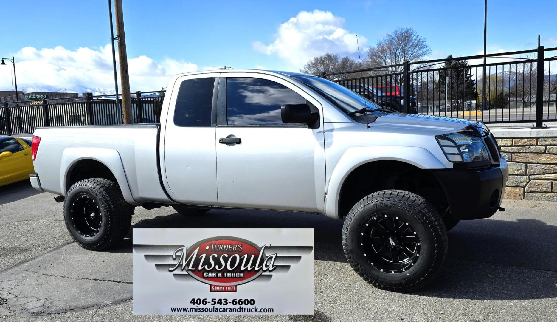 2004 Silver /Black Nissan Titan XE Club Cab 4WD (1N6AA06BX4N) with an 5.6L V8 DOHC 32V engine, 5-Speed Automatic Overdrive transmission, located at 450 N Russell, Missoula, MT, 59801, (406) 543-6600, 46.874496, -114.017433 - Beefy 4WD Nissan Titan with the Powerful 5.6L V8 Engine. Automatic Transmission. Comes with Nice Moto Metal Wheels and Open Range All Terrain Tires. Lifted . Air Conditioning. Aftermarket Kenwood CD Player. Because of the age, our lenders do NOT financing on this Vehicle and we do NOT offer - Photo#0