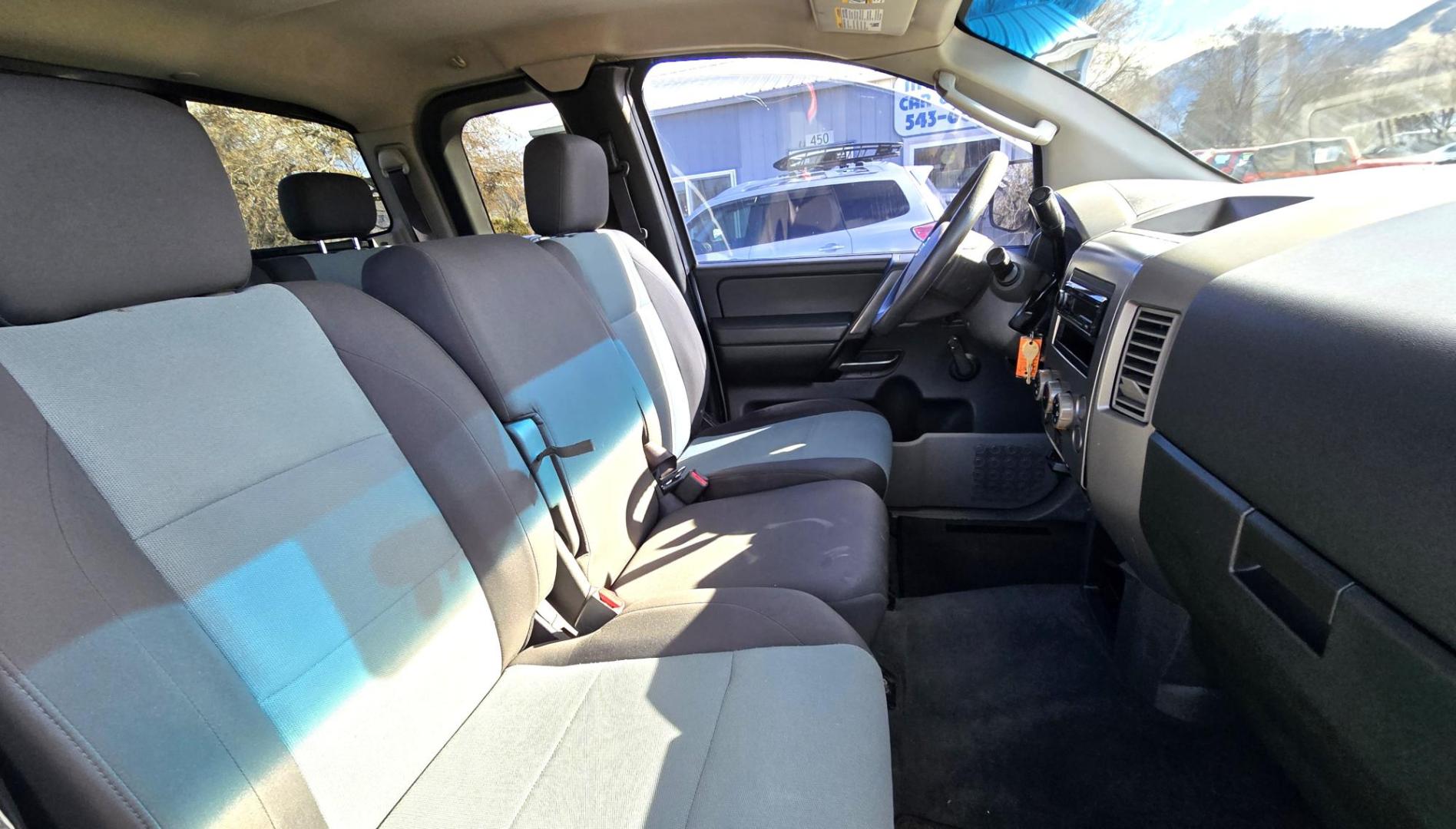 2004 Silver /Black Nissan Titan XE Club Cab 4WD (1N6AA06BX4N) with an 5.6L V8 DOHC 32V engine, 5-Speed Automatic Overdrive transmission, located at 450 N Russell, Missoula, MT, 59801, (406) 543-6600, 46.874496, -114.017433 - Beefy 4WD Nissan Titan with the Powerful 5.6L V8 Engine. Automatic Transmission. Comes with Nice Moto Metal Wheels and Open Range All Terrain Tires. Lifted . Air Conditioning. Aftermarket Kenwood CD Player. Because of the age, our lenders do NOT financing on this Vehicle and we do NOT offer - Photo#9