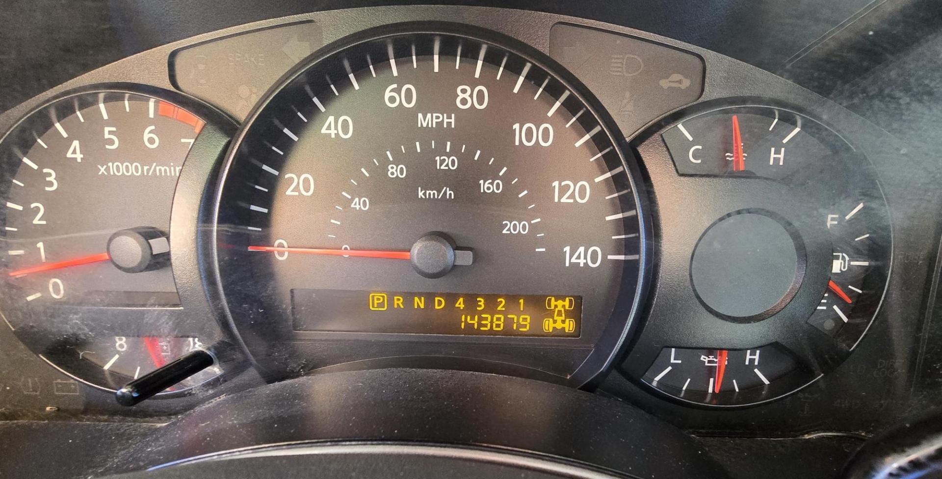 2004 Silver /Black Nissan Titan XE Club Cab 4WD (1N6AA06BX4N) with an 5.6L V8 DOHC 32V engine, 5-Speed Automatic Overdrive transmission, located at 450 N Russell, Missoula, MT, 59801, (406) 543-6600, 46.874496, -114.017433 - Beefy 4WD Nissan Titan with the Powerful 5.6L V8 Engine. Automatic Transmission. Comes with Nice Moto Metal Wheels and Open Range All Terrain Tires. Lifted . Air Conditioning. Aftermarket Kenwood CD Player. Because of the age, our lenders do NOT financing on this Vehicle and we do NOT offer - Photo#13