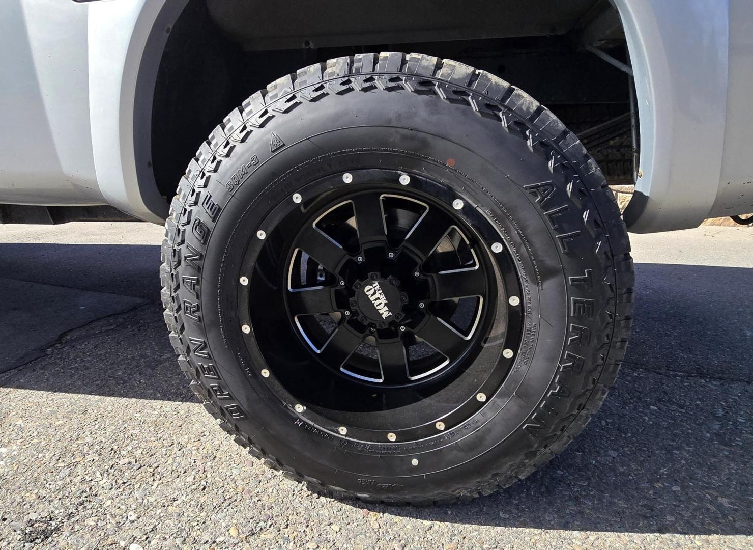 2004 Silver /Black Nissan Titan XE Club Cab 4WD (1N6AA06BX4N) with an 5.6L V8 DOHC 32V engine, 5-Speed Automatic Overdrive transmission, located at 450 N Russell, Missoula, MT, 59801, (406) 543-6600, 46.874496, -114.017433 - Beefy 4WD Nissan Titan with the Powerful 5.6L V8 Engine. Automatic Transmission. Comes with Nice Moto Metal Wheels and Open Range All Terrain Tires. Lifted . Air Conditioning. Aftermarket Kenwood CD Player. Because of the age, our lenders do NOT financing on this Vehicle and we do NOT offer - Photo#16