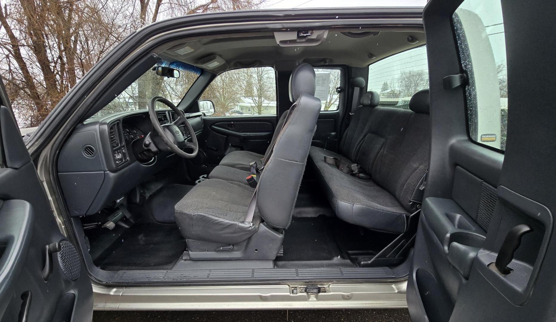 2002 Pewter /Gray Chevrolet Silverado 2500 Ext. Cab 4WD (1GCGK29UX2Z) with an 6.0L V8 OHV 16V engine, 4-Speed Automatic Overdrive transmission, located at 450 N Russell, Missoula, MT, 59801, (406) 543-6600, 46.874496, -114.017433 - Former State of Montana 3/4 Ton 4WD. So it has had excellent maintenance. Strong 6.0L V8 Engine. This Engine did NOT have the problematic cylinder deactivation system. Automatic Transmission. Air Conditioning. Old School Crank Windows for those who like things simple. AM FM Radio. Nice Grill Guar - Photo#11