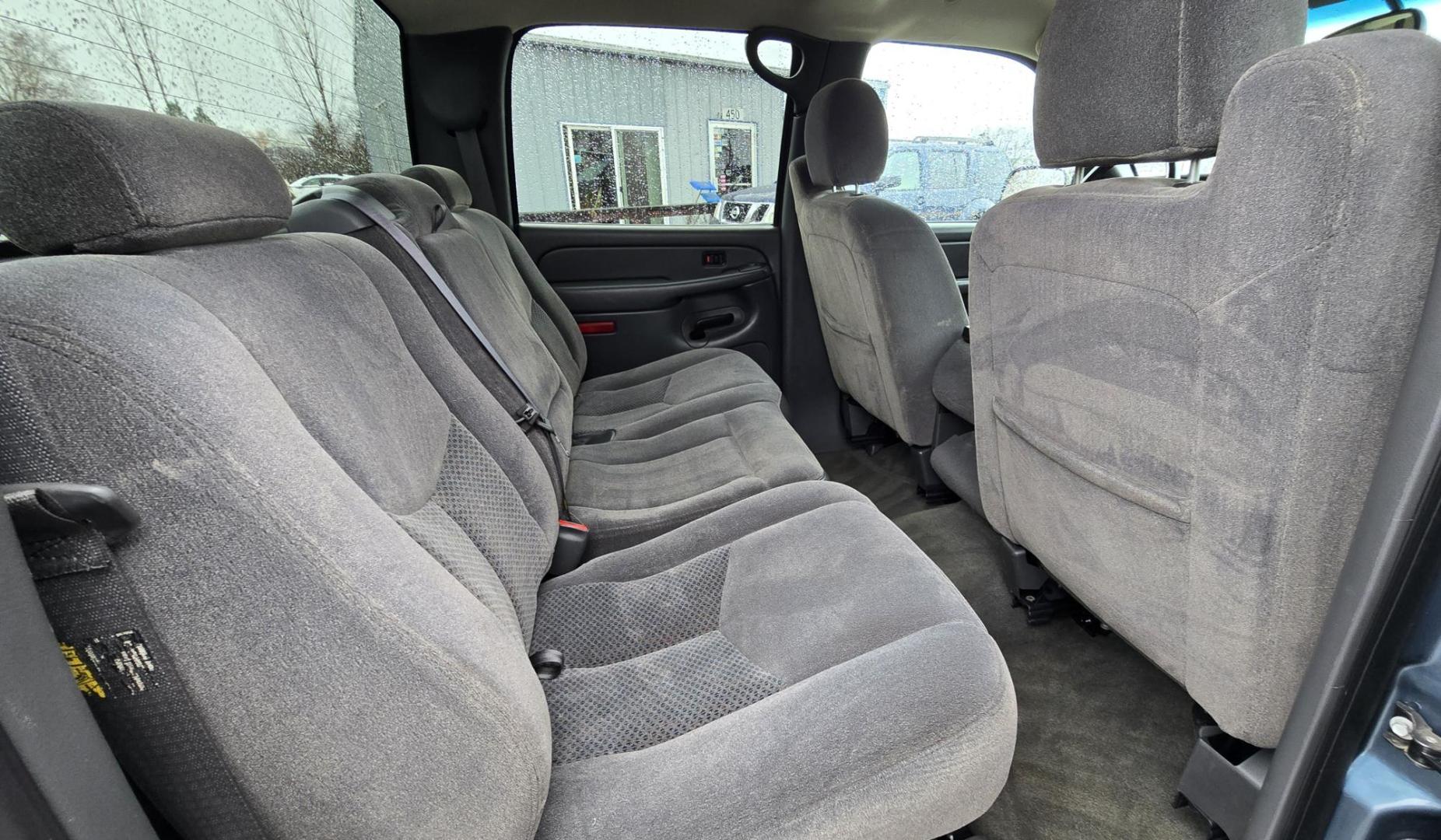 2006 Blue /Gray Chevrolet Silverado 1500 LS2 Crew Cab 4WD (2GCEK13T961) with an 5.3L V8 OHV 16V engine, 4-Speed Automatic Overdrive transmission, located at 450 N Russell, Missoula, MT, 59801, (406) 543-6600, 46.874496, -114.017433 - Very Nice 4WD Chevy with the Z71 Off-Road Package. 5.3L V8 Engine that has a 120K miles on it. Automatic Transmission. Power drivers Seat. Can Switch between 2WD, Auto 4WD and 4WD with a push of the button. Air Conditioning. Cruise Control. Power Windows and Locks. AM FM CD Player. Interior is very - Photo#9