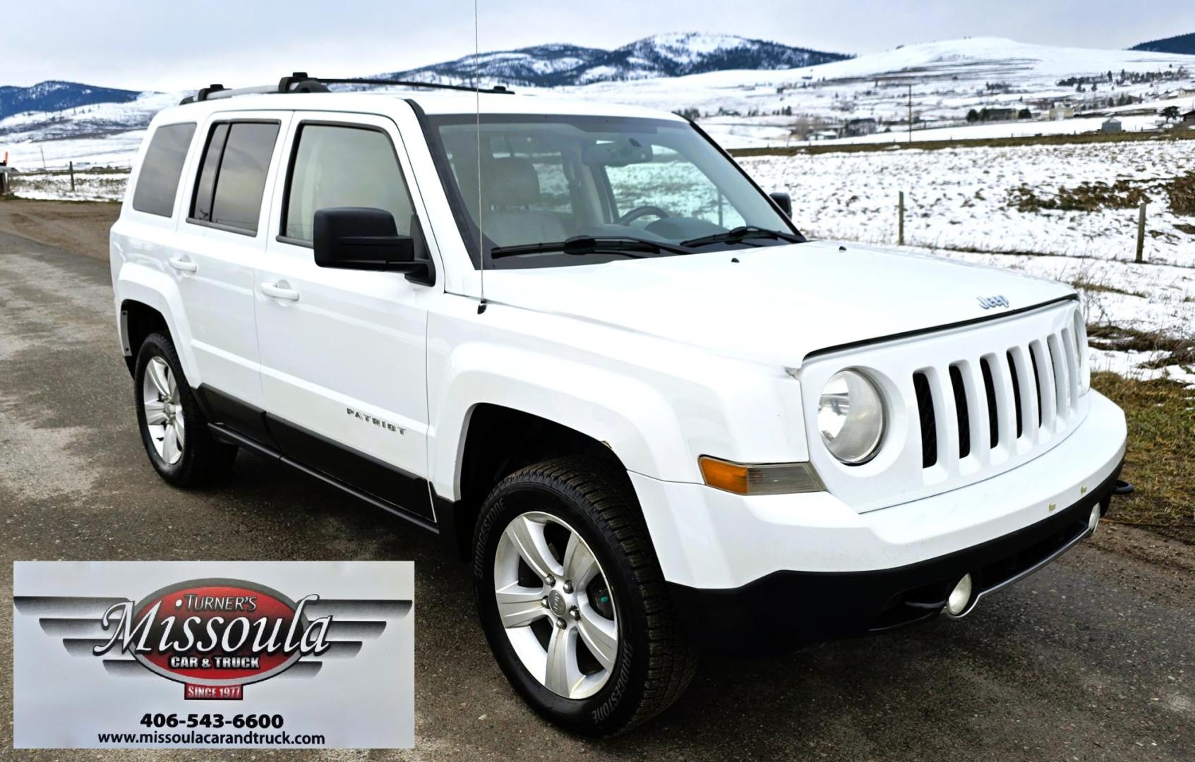 2014 White /Tan Jeep Patriot Limited 4WD (1C4NJRCB0ED) with an 2.4L L4 DOHC 16V engine, Automatic transmission, located at 450 N Russell, Missoula, MT, 59801, (406) 543-6600, 46.874496, -114.017433 - Cute 4WD Jeep Patriot. 2.4L I4 Engine has good Pep but also gets solid fuel economy. Automatic Transmission. Air. Cruise. Tilt. Power Windows and Locks. Bluetooth. AM FM CD Player. Power Drivers Seat. Heated Front Seats. Bridgestone Tires. Runs and Drives Excellent. Cl - Photo#6