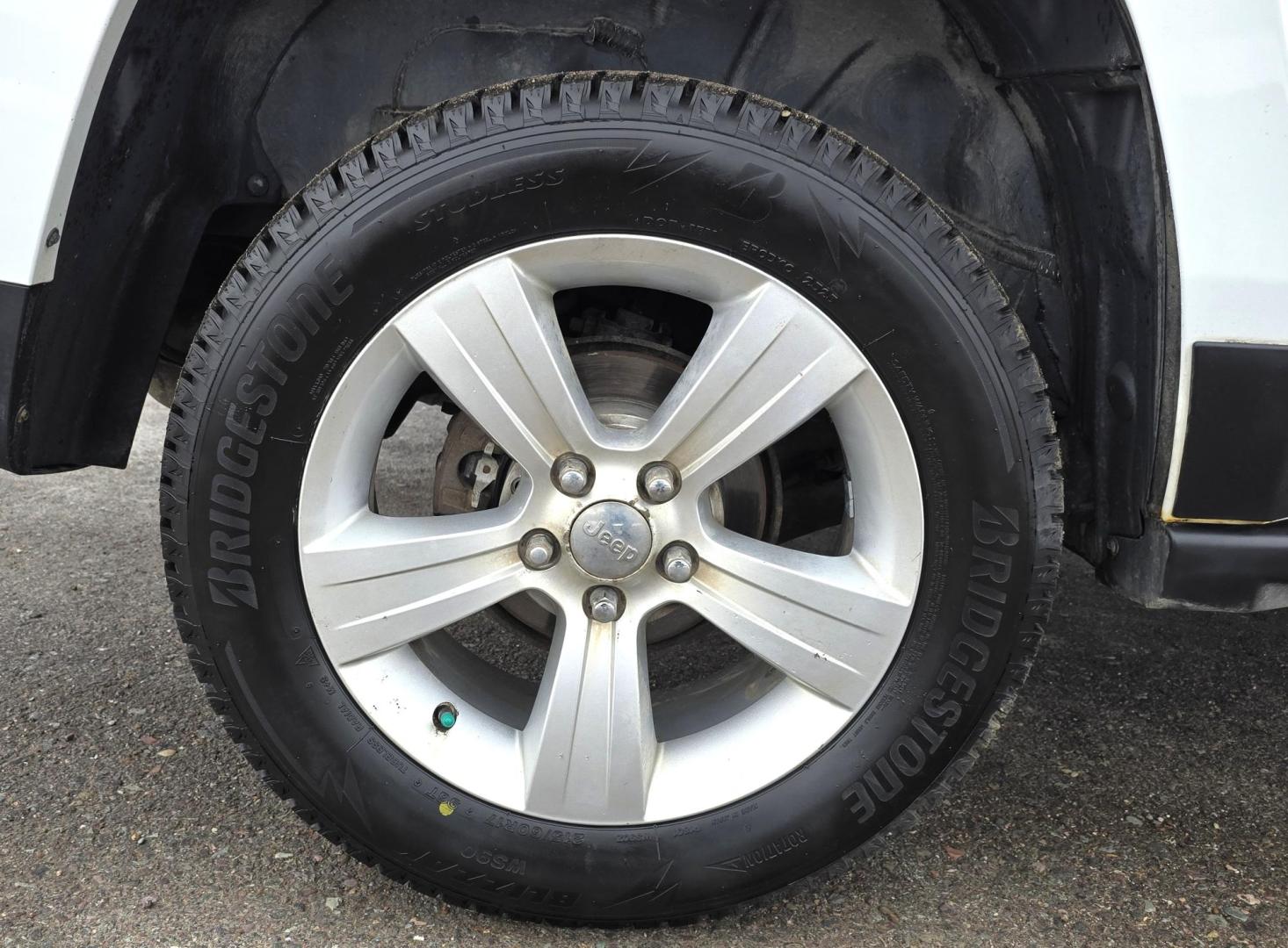 2014 White /Tan Jeep Patriot Limited 4WD (1C4NJRCB0ED) with an 2.4L L4 DOHC 16V engine, Automatic transmission, located at 450 N Russell, Missoula, MT, 59801, (406) 543-6600, 46.874496, -114.017433 - Cute 4WD Jeep Patriot. 2.4L I4 Engine has good Pep but also gets solid fuel economy. Automatic Transmission. Air. Cruise. Tilt. Power Windows and Locks. Bluetooth. AM FM CD Player. Power Drivers Seat. Heated Front Seats. Bridgestone Tires. Runs and Drives Excellent. Cl - Photo#7