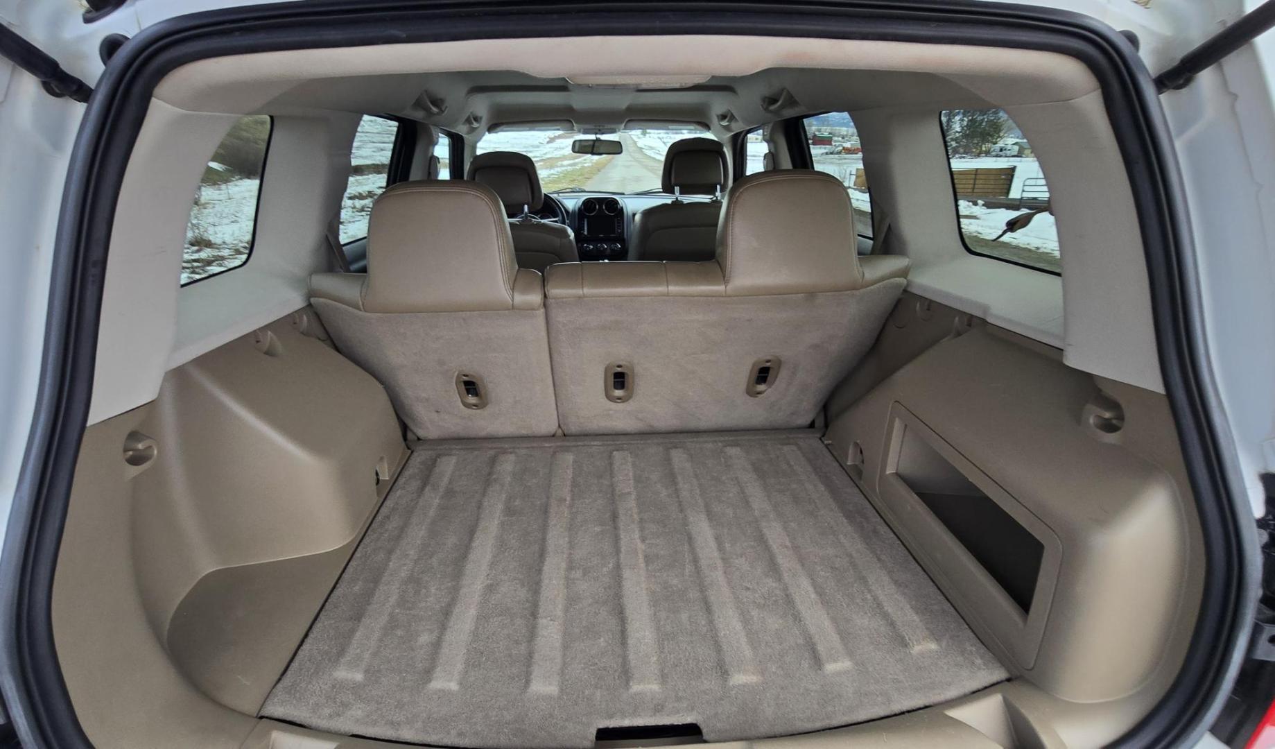 2014 White /Tan Jeep Patriot Limited 4WD (1C4NJRCB0ED) with an 2.4L L4 DOHC 16V engine, Automatic transmission, located at 450 N Russell, Missoula, MT, 59801, (406) 543-6600, 46.874496, -114.017433 - Cute 4WD Jeep Patriot. 2.4L I4 Engine has good Pep but also gets solid fuel economy. Automatic Transmission. Air. Cruise. Tilt. Power Windows and Locks. Bluetooth. AM FM CD Player. Power Drivers Seat. Heated Front Seats. Bridgestone Tires. Runs and Drives Excellent. Cl - Photo#9