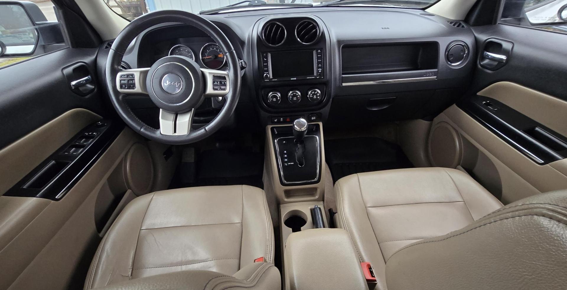 2014 White /Tan Jeep Patriot Limited 4WD (1C4NJRCB0ED) with an 2.4L L4 DOHC 16V engine, Automatic transmission, located at 450 N Russell, Missoula, MT, 59801, (406) 543-6600, 46.874496, -114.017433 - Cute 4WD Jeep Patriot. 2.4L I4 Engine has good Pep but also gets solid fuel economy. Automatic Transmission. Air. Cruise. Tilt. Power Windows and Locks. Bluetooth. AM FM CD Player. Power Drivers Seat. Heated Front Seats. Bridgestone Tires. Runs and Drives Excellent. Cl - Photo#12