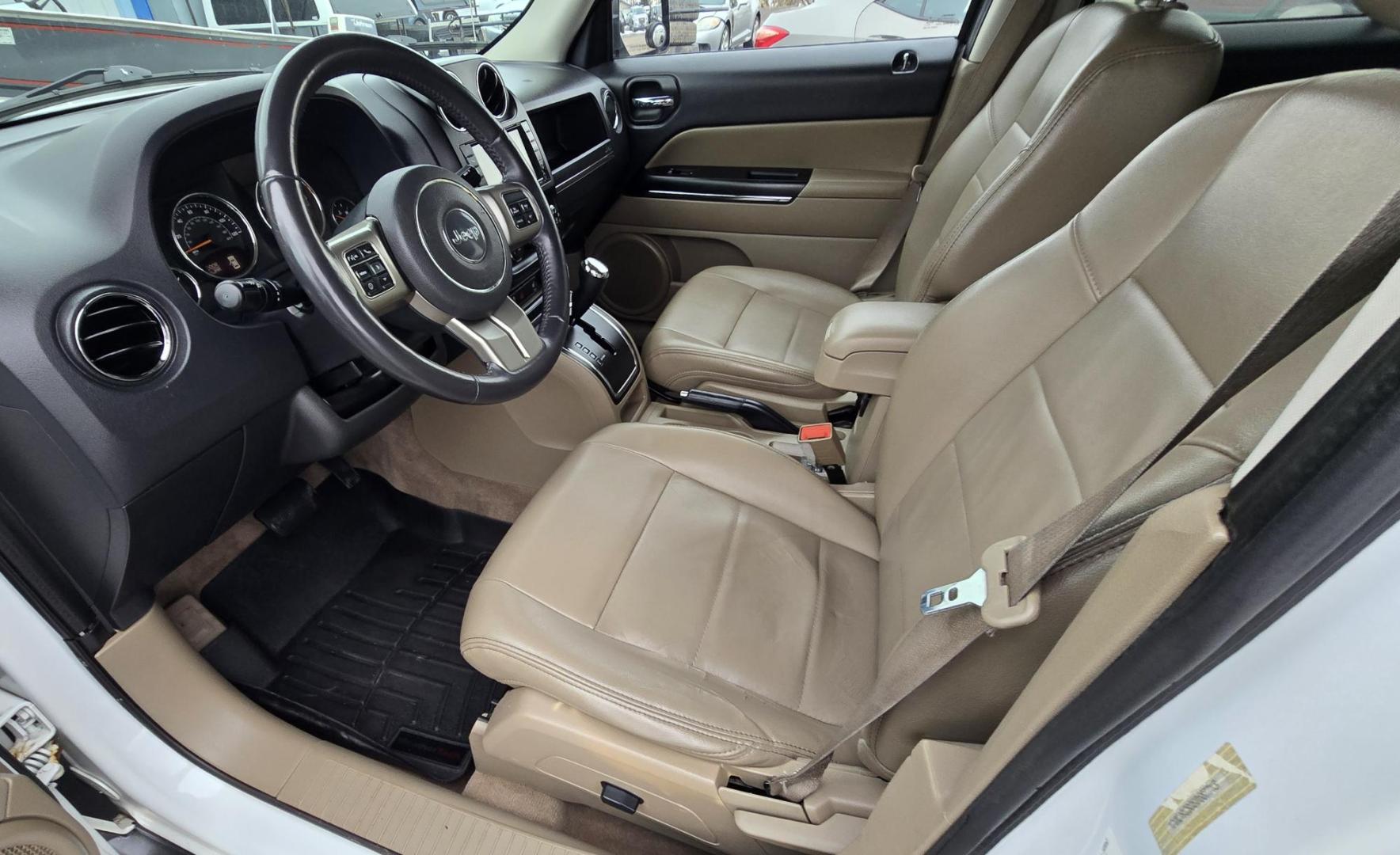 2014 White /Tan Jeep Patriot Limited 4WD (1C4NJRCB0ED) with an 2.4L L4 DOHC 16V engine, Automatic transmission, located at 450 N Russell, Missoula, MT, 59801, (406) 543-6600, 46.874496, -114.017433 - Cute 4WD Jeep Patriot. 2.4L I4 Engine has good Pep but also gets solid fuel economy. Automatic Transmission. Air. Cruise. Tilt. Power Windows and Locks. Bluetooth. AM FM CD Player. Power Drivers Seat. Heated Front Seats. Bridgestone Tires. Runs and Drives Excellent. Cl - Photo#13