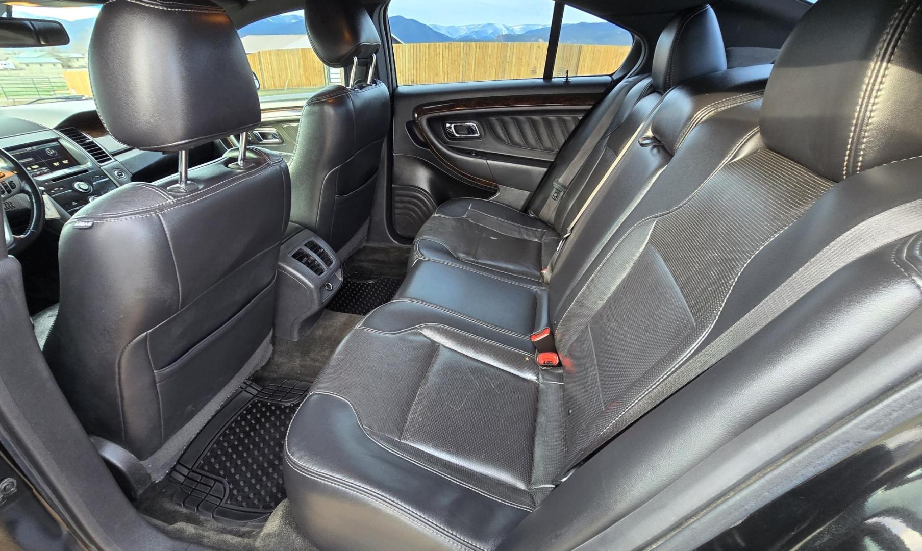 2013 Black /Black Ford Taurus Limited FWD (1FAHP2F88DG) with an 3.5L V6 DOHC 24V engine, 6-Speed Automatic transmission, located at 450 N Russell, Missoula, MT, 59801, (406) 543-6600, 46.874496, -114.017433 - Classy Looking Ford Taurus. Zippy 3.5L V8 also gives you solid fuel economy. 6 Speed Automatic Transmission. Air. Cruise. Tilt. Backup Camera. AM FM CD Player. Bluetooth Audio and Phone Connection. Front Wheel Drive. Power Windows and Locks. Remote Ignition. We Finance through local Credit Union - Photo#12