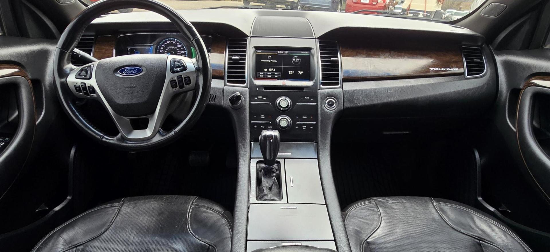 2013 Black /Black Ford Taurus Limited FWD (1FAHP2F88DG) with an 3.5L V6 DOHC 24V engine, 6-Speed Automatic transmission, located at 450 N Russell, Missoula, MT, 59801, (406) 543-6600, 46.874496, -114.017433 - Classy Looking Ford Taurus. Zippy 3.5L V8 also gives you solid fuel economy. 6 Speed Automatic Transmission. Air. Cruise. Tilt. Backup Camera. AM FM CD Player. Bluetooth Audio and Phone Connection. Front Wheel Drive. Power Windows and Locks. Remote Ignition. We Finance through local Credit Union - Photo#17