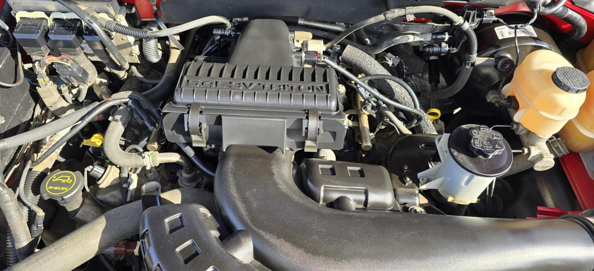 2008 Red /Gray Ford F-150 FX4 SuperCrew (1FTPW14V08K) with an 5.4L V8 SOHC 24V FFV engine, 4-Speed Automatic Overdrive transmission, located at 450 N Russell, Missoula, MT, 59801, (406) 543-6600, 46.874496, -114.017433 - Very Clean and Straight Ford F150 4WD. Excellent Miles! 5.4L V8 Engine. Automatic Transmission. Power Windows and Locks. Air Conditioning. Cruise Control. Tilt. Adjustable Foot Pedals. Power Drivers Seat. Tonneau Cover. Clean Title and Carfax. We Finance through local Credit Unions. We do NOT off - Photo#14